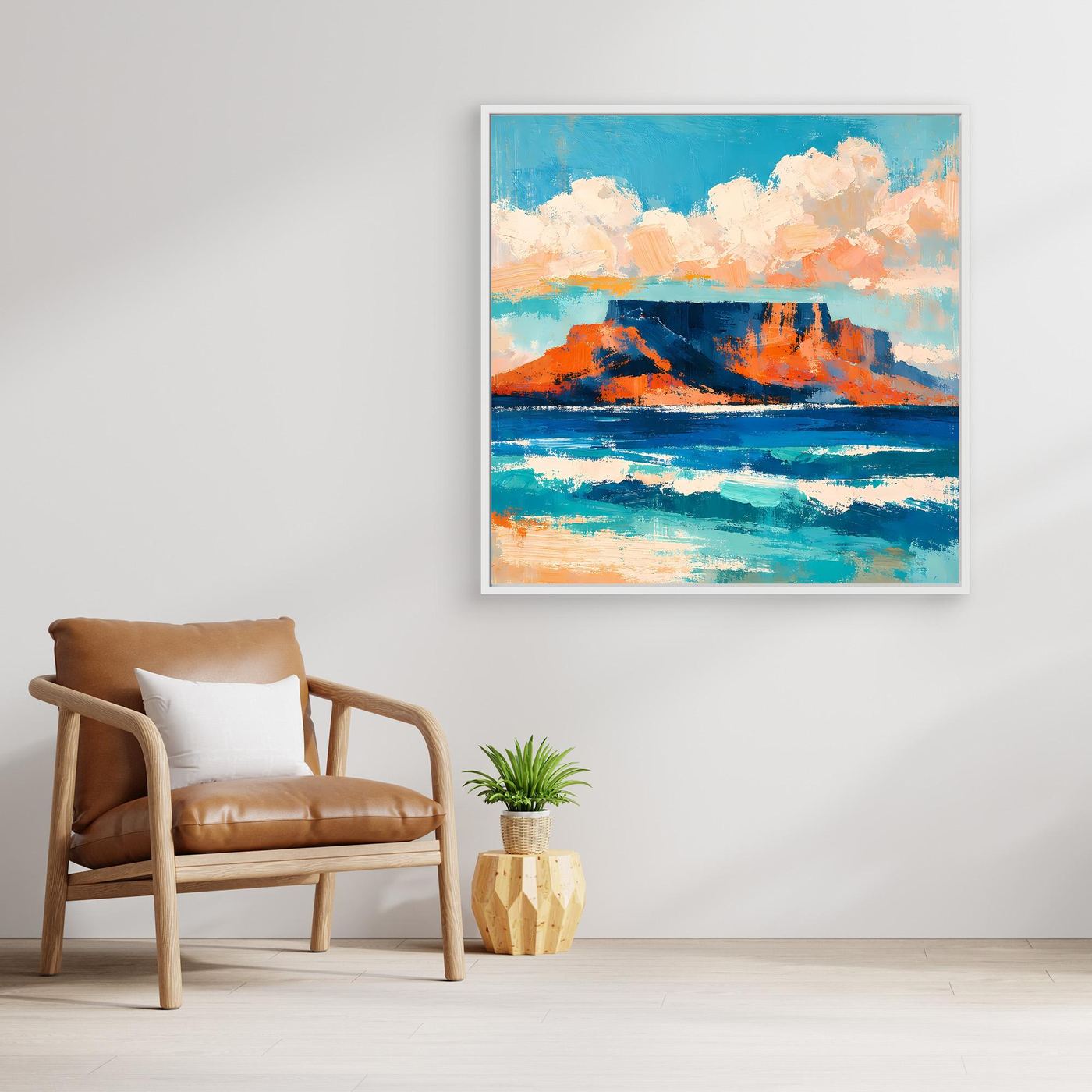 Abstraktes Leinwand-Wandbild mit blauem Meer, orangefarbenen Felsen und Wolken im weißen Rahmen