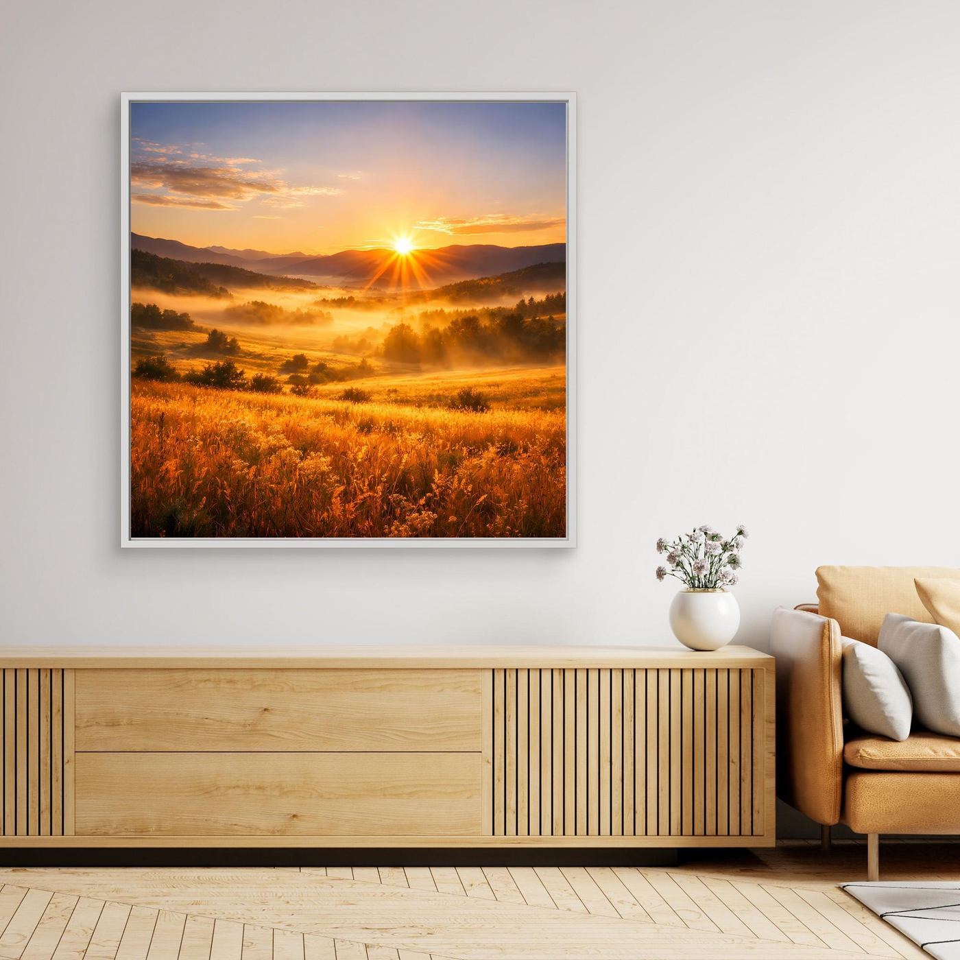 Gerahmtes Leinwandbild mit Sonnenaufgang über Bergtal und goldenen Wiesen