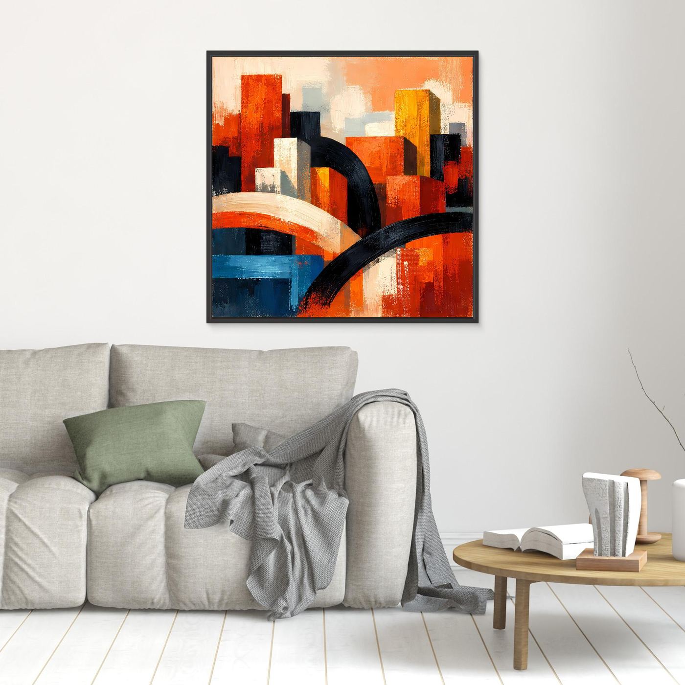 Abstraktes Skyline-Leinwandbild im schwarzen Rahmen: orange, rot und blau, mit schwarzer Bogenlinie.