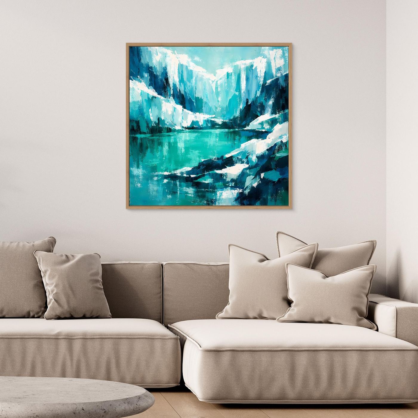 Abstraktes Wandbild mit Eisbergen und Ozean in Blau‑Türkis, mit goldfarbenem Rahmen