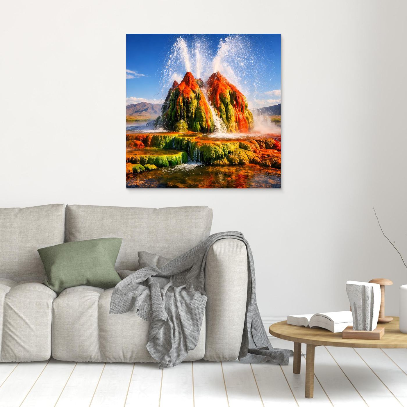 Leinwandbild mit Geysir-Fontänen über Landschaft in Grün, Orange und Blau