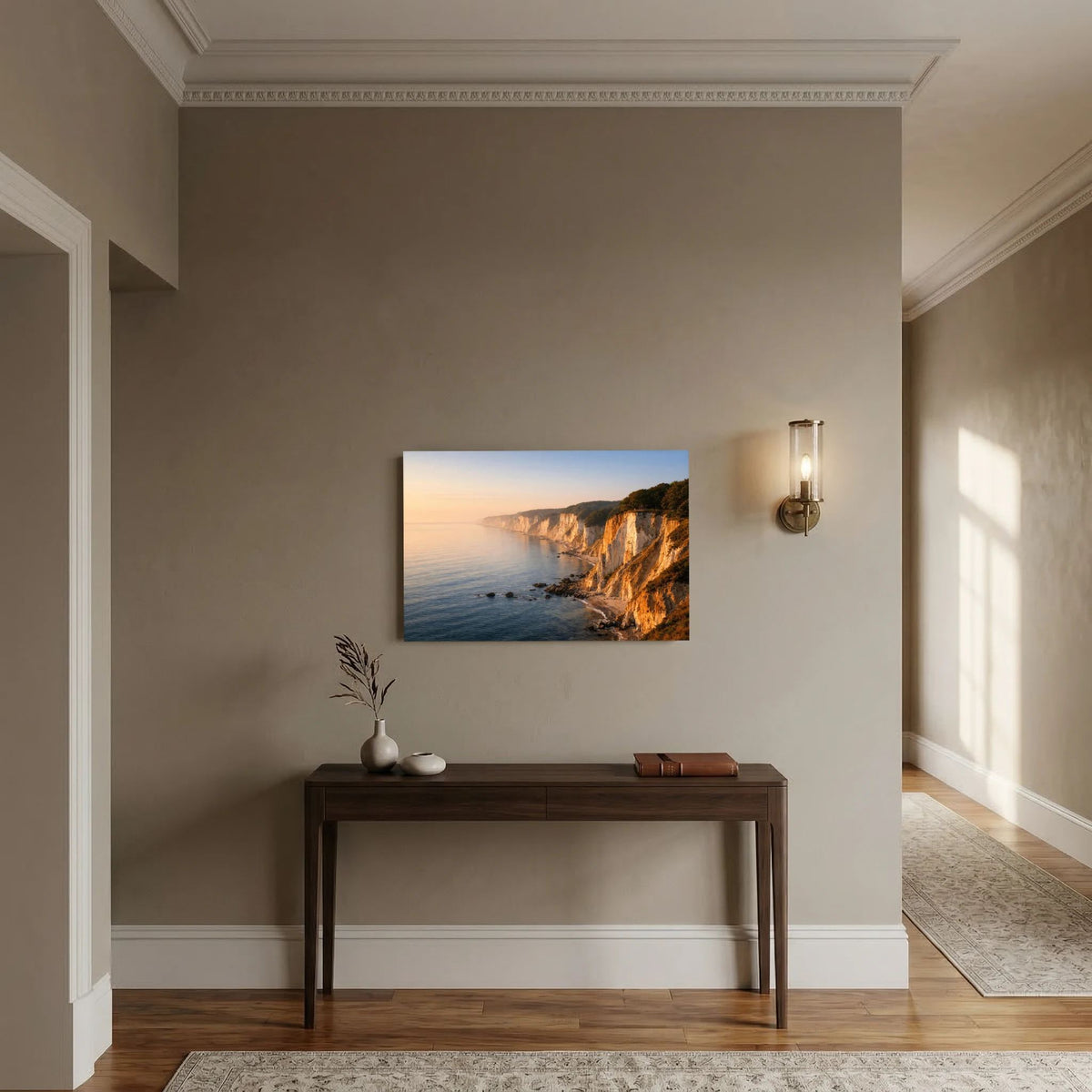 Wandbild im Querformat mit Küstenfelsen und ruhigem Meer bei Sonnenaufgang