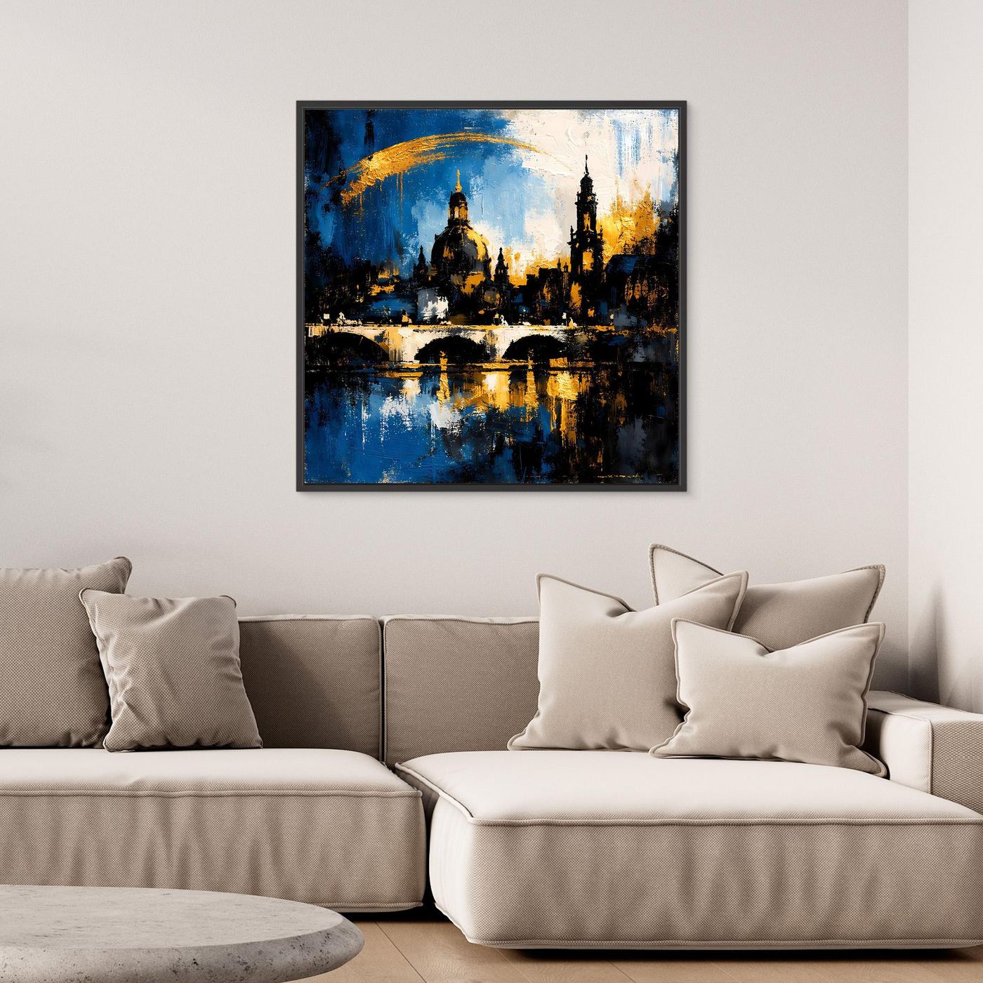 Leinwand-Wandbild mit abstrakter Skyline, blau-goldfarben, in schwarzem Rahmen.
