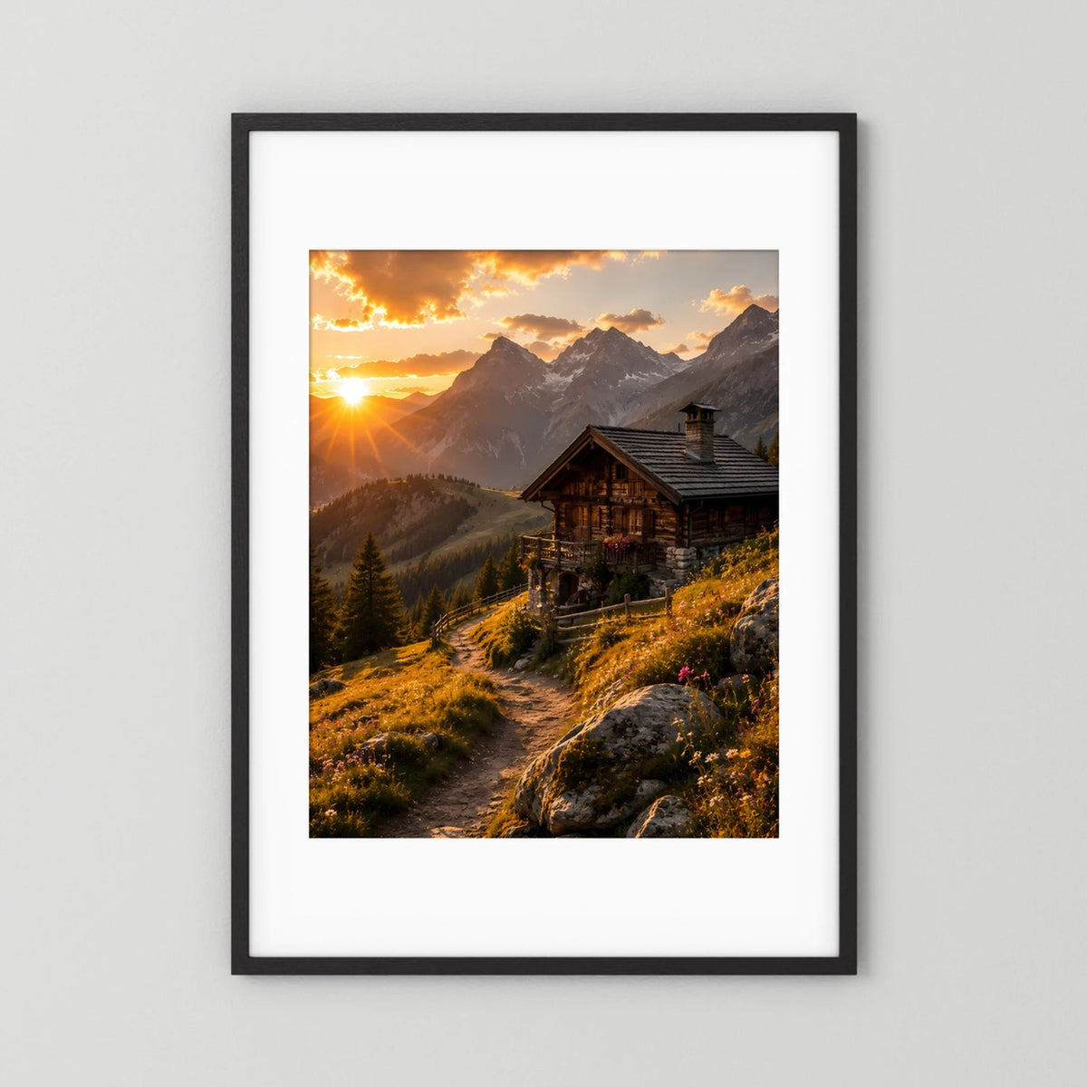 Hochformat-Poster mit schwarzem Rahmen und weißem Rand: Berghütte bei Sonnenuntergang