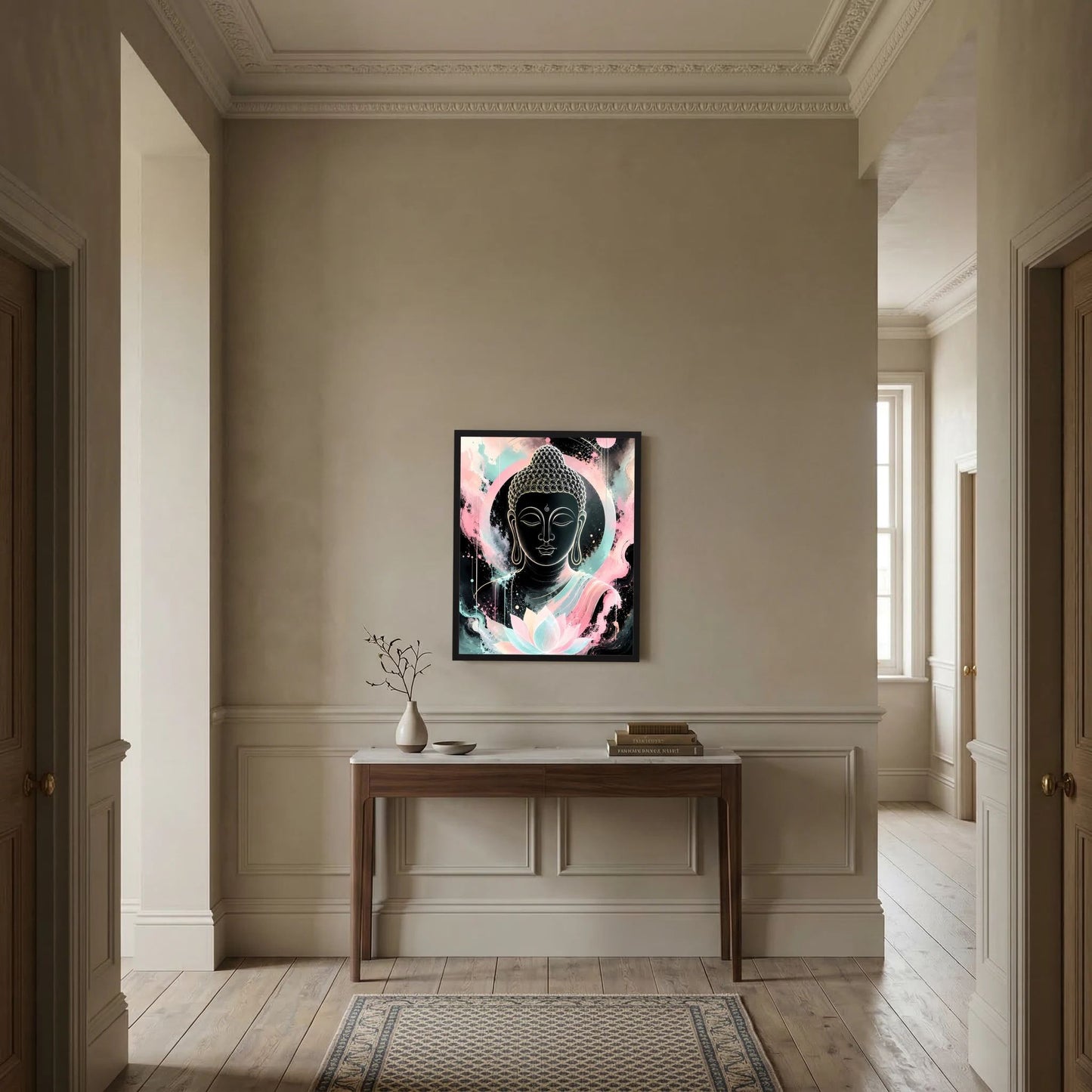 Buddha-Poster im Hochformat mit schwarzer Buddhafigur und Lotusblüte in Pastellfarben an Flurkonsole