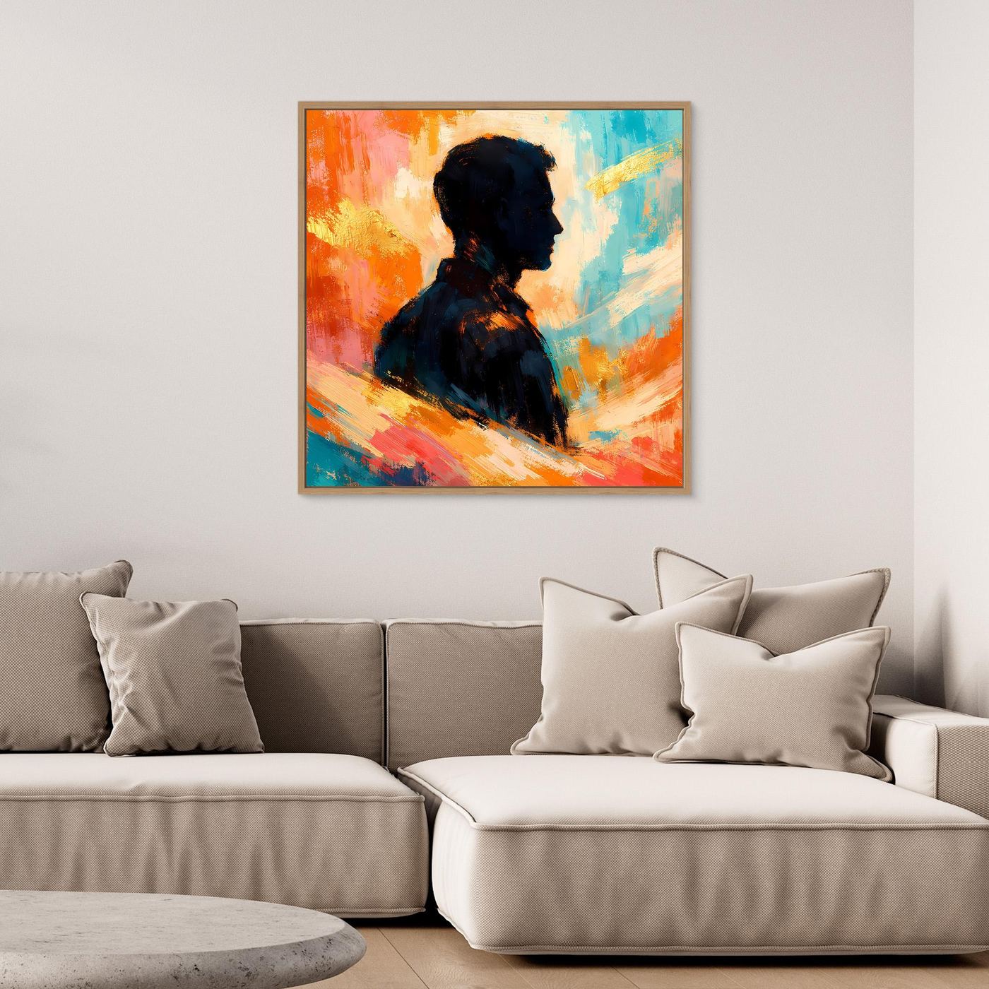 Gerahmtes Leinwandbild mit abstrakter Silhouette eines Mannes, bunte warme Farben.