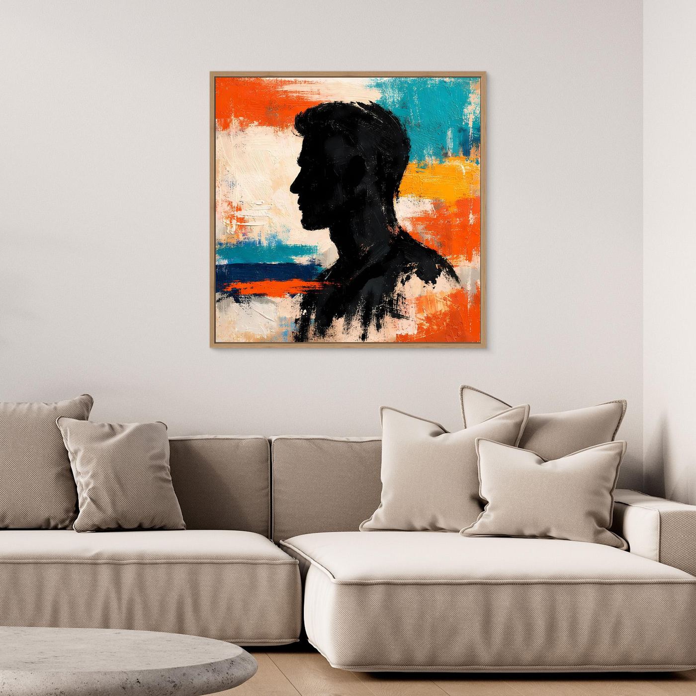 Framed abstract canvas wall art featuring a male silhouette with orange, teal and black tones