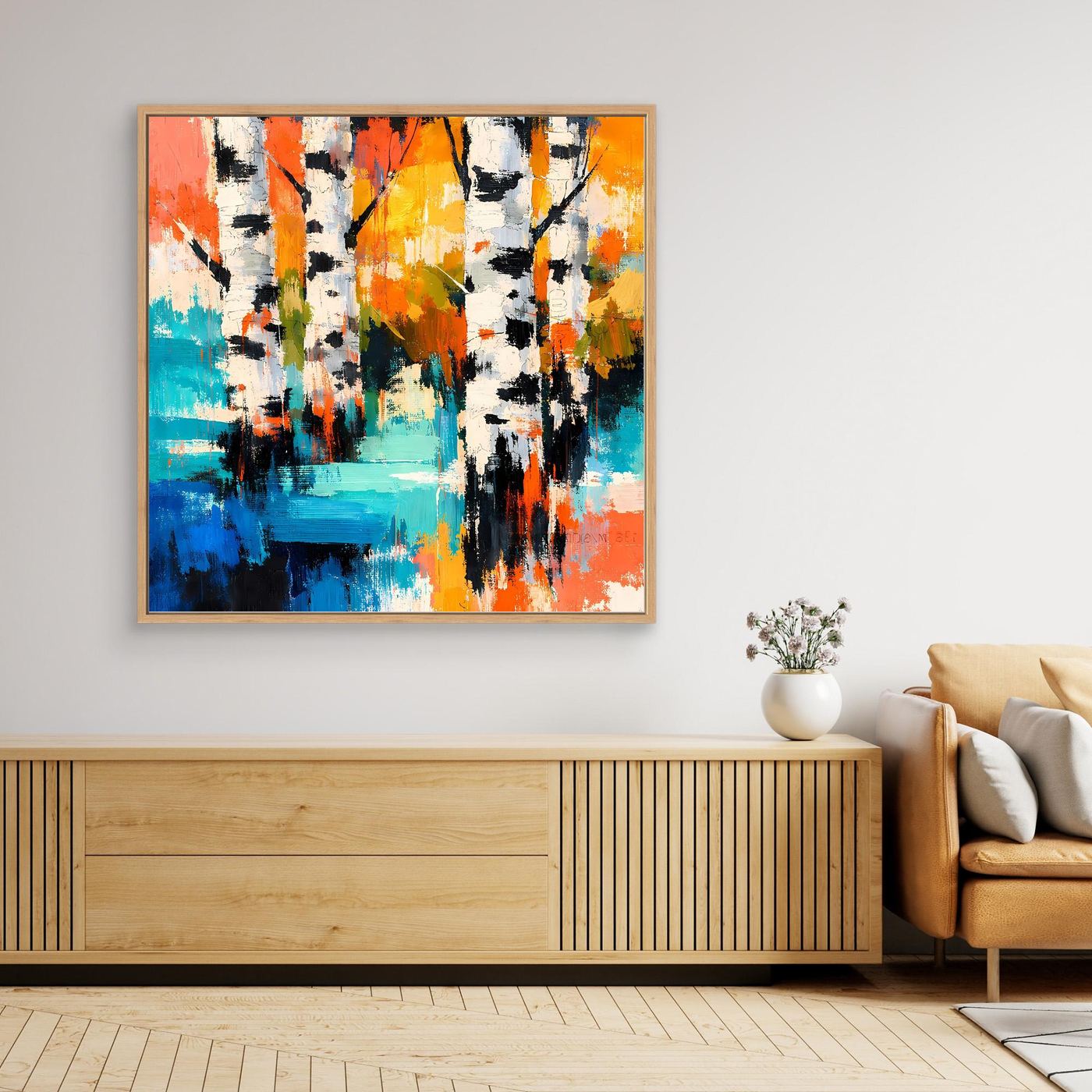 Wood-framed abstract birch forest canvas art with orange, yellow, teal blue, and black marks.