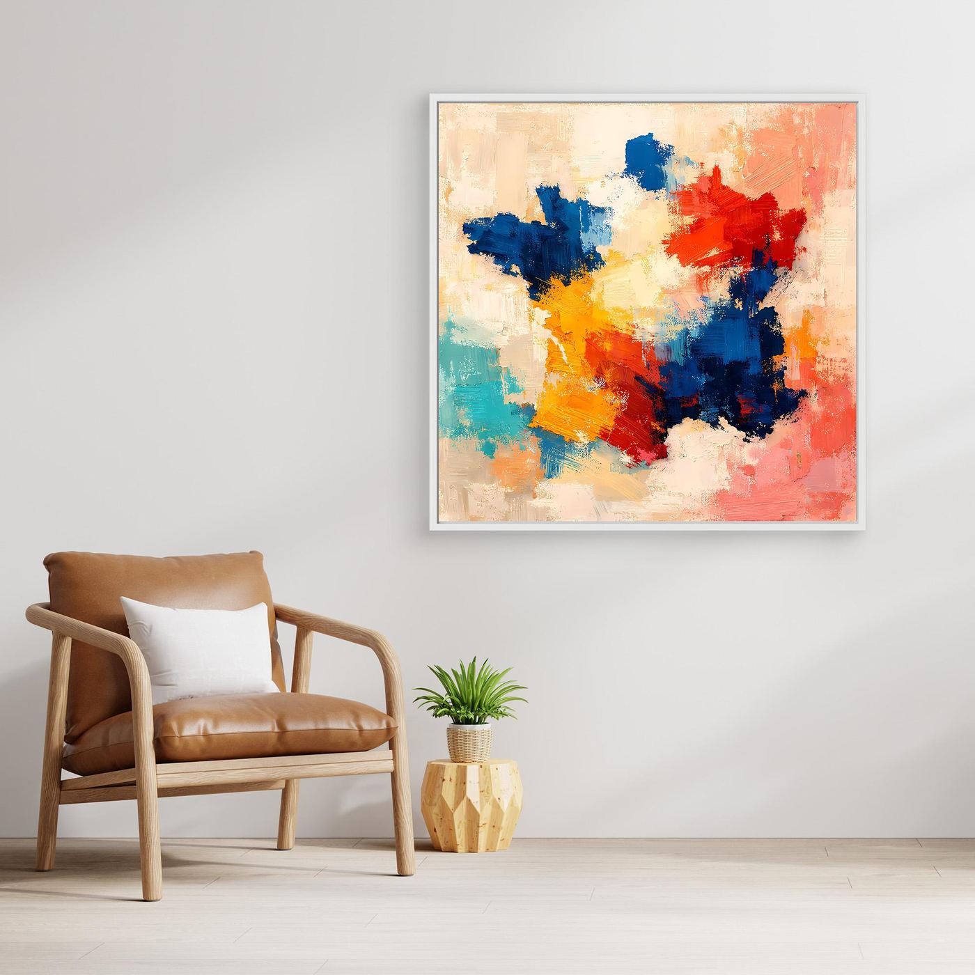 Abstract canvas wall art with blue, red, yellow, and teal paint splashes, no visible frame.