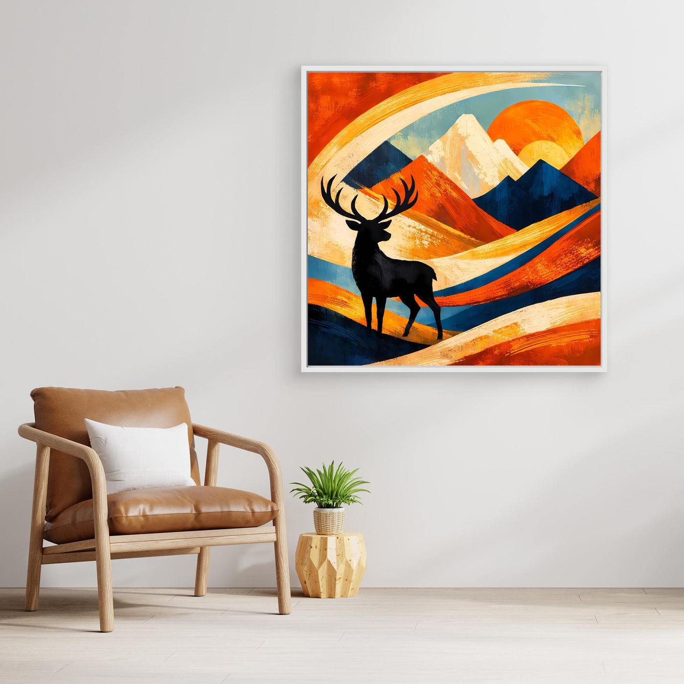 Leinwandbild mit Hirschsilhouette und leuchtenden Bergen in Orange, Blau und Gelb