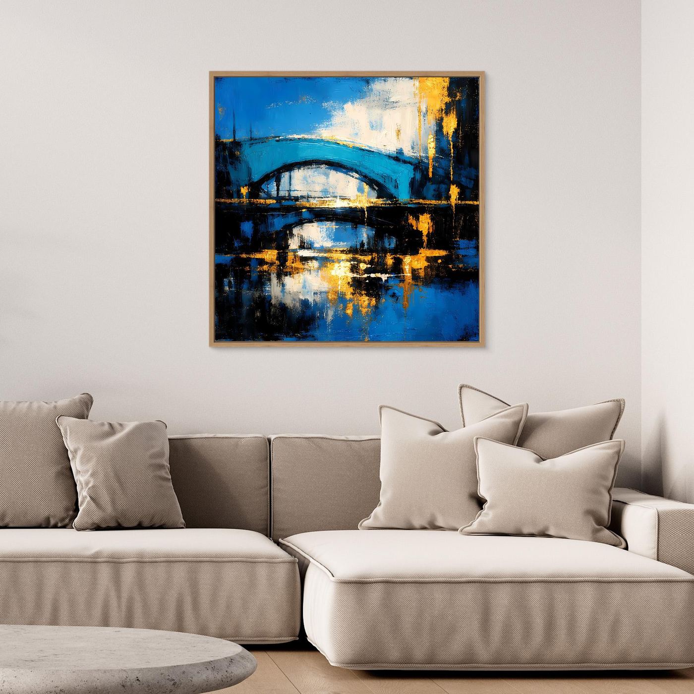 Abstraktes Leinwandbild mit Brücke in Blau und Gold, mit hellem Rahmen.