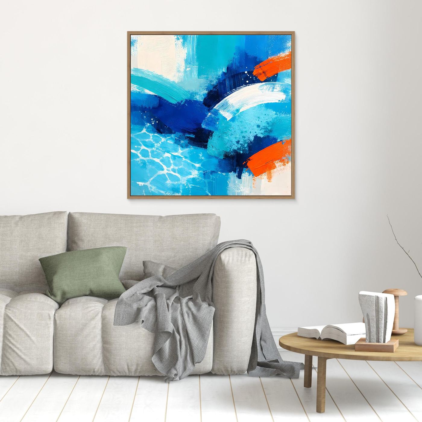Blue and orange abstract ocean wave canvas in an oak wood frame.