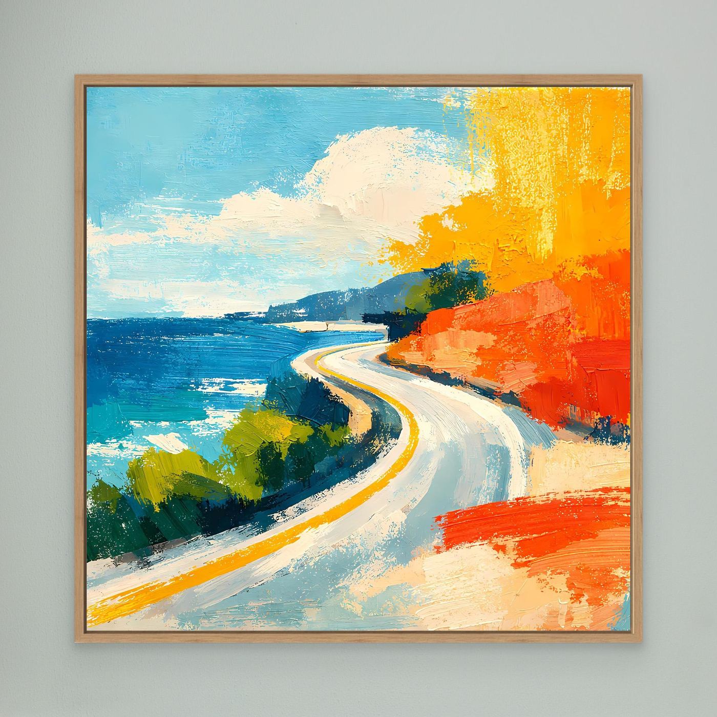 Abstract coastal street wall art with oak frame; curving road, blue sea, orange and yellow