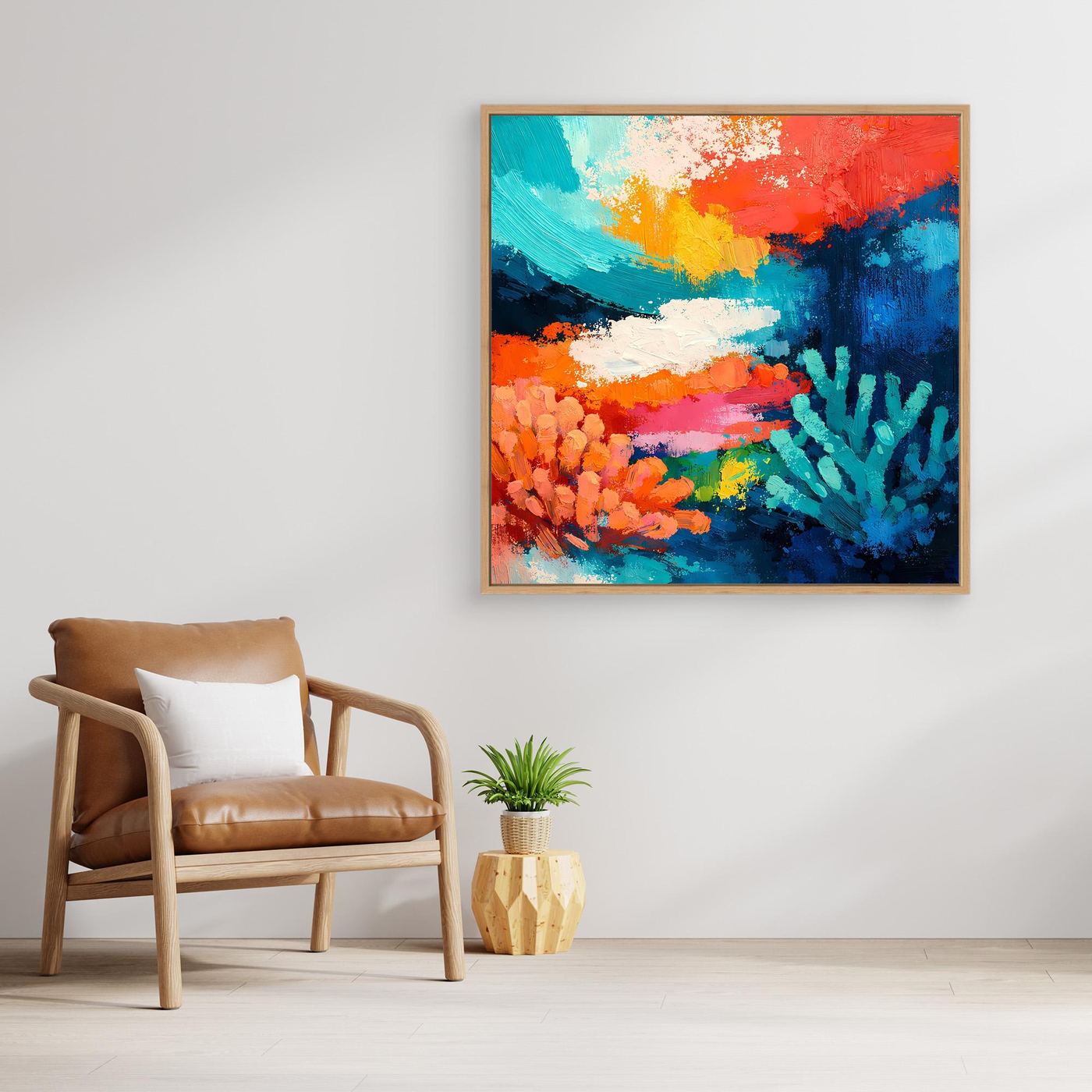Abstraktes Leinwand-Wandbild mit Korallenriff-Motiv in Blau, Orange und Grün, mit goldfarbenem Rahmen