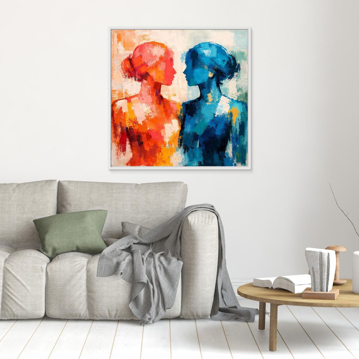 Kleines abstraktes Wandbild mit zwei Profilen, rot und blau, im weißen Rahmen