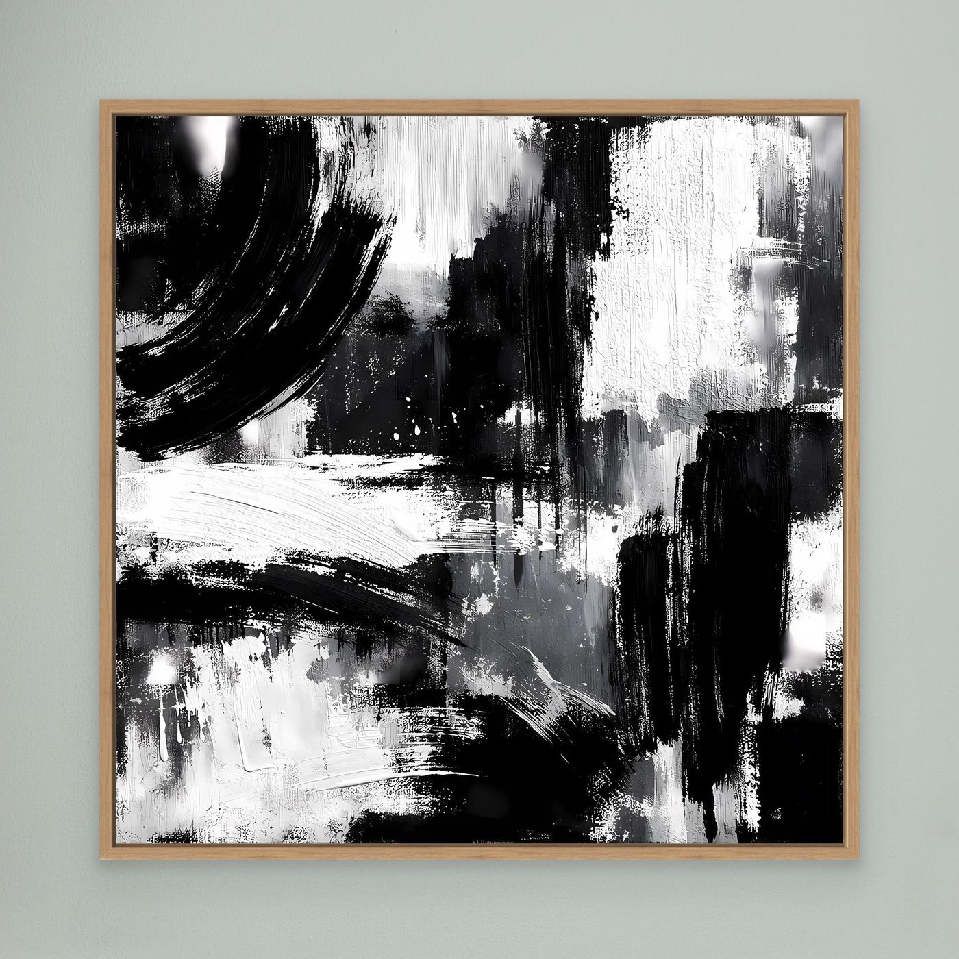 Framed abstract black-and-white canvas painting with brush strokes, oak frame