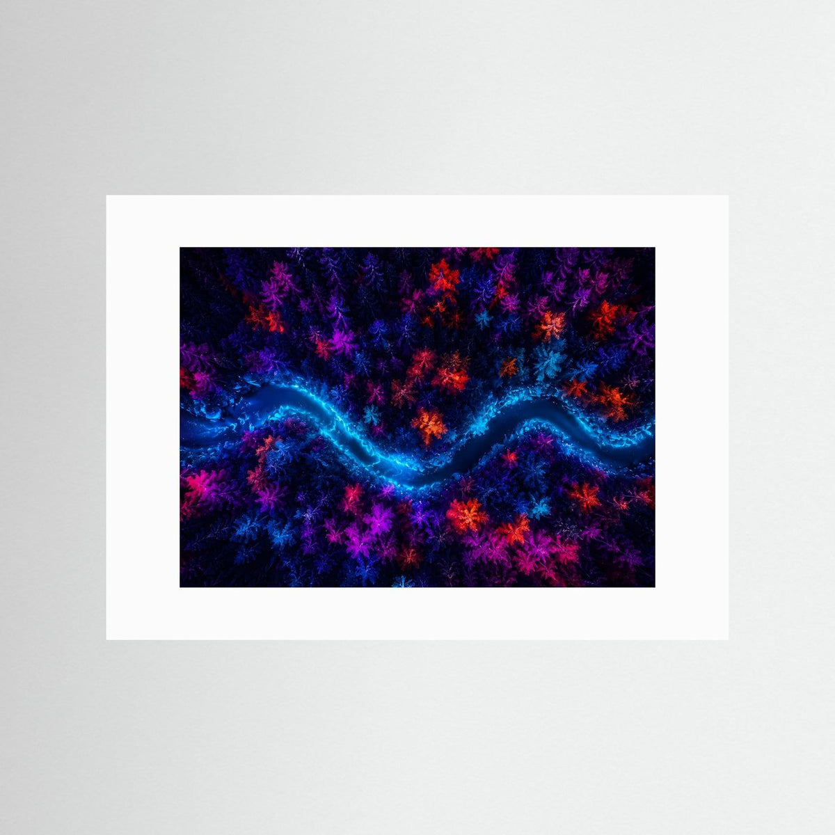 Wandbild im weißen Passepartout mit Neonfluss, bunte Baumkronen in Blau und Pink
