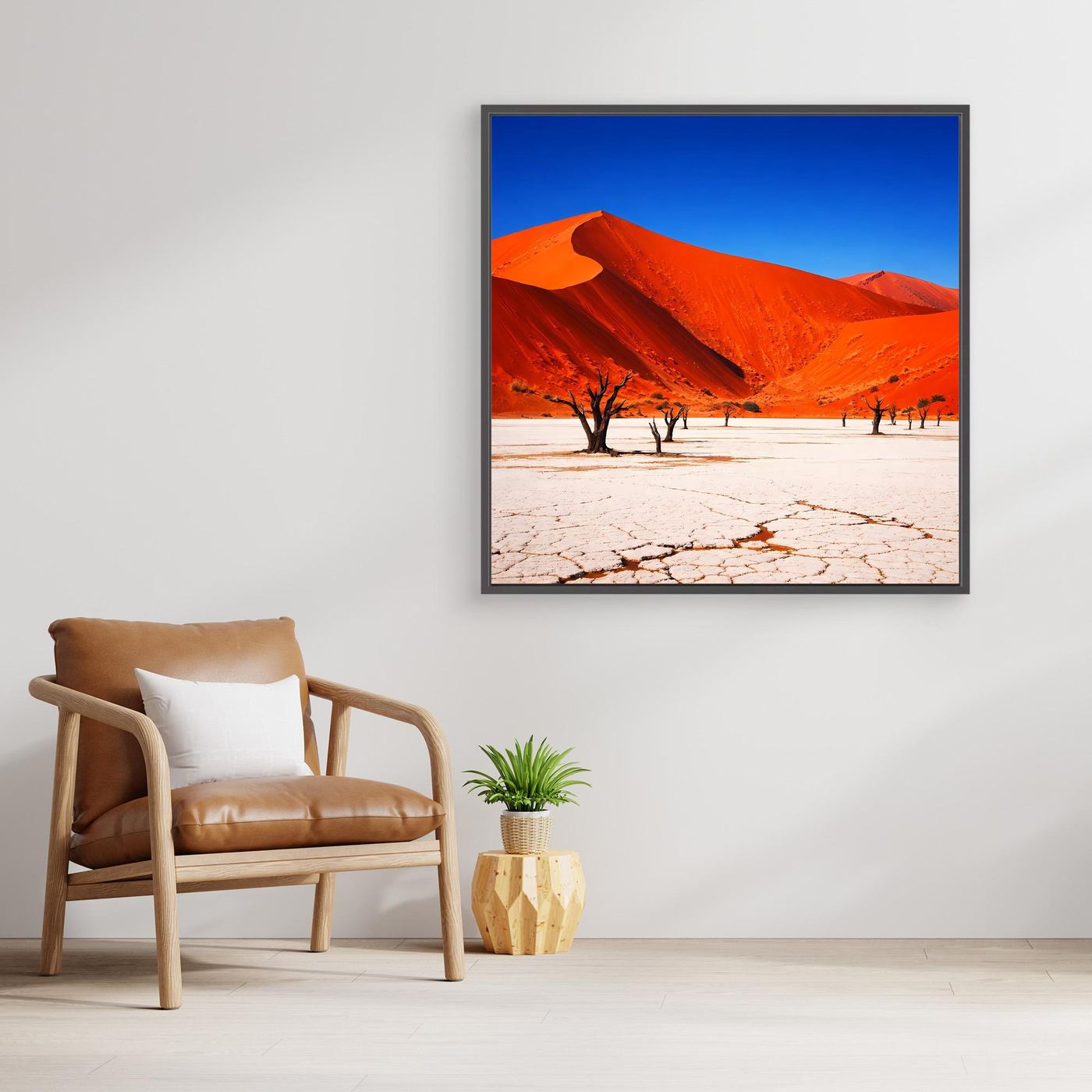 Leinwandbild mit roten Dünen, blauem Himmel und knochentrockenem, rissigem Untergrund