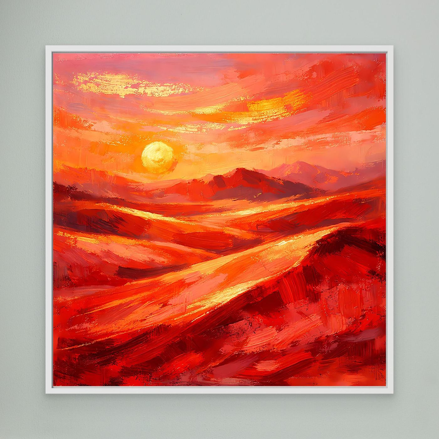 Gerahmtes Leinwandbild mit abstraktem Sonnenaufgang in Rot-Orange, weißer Rahmen