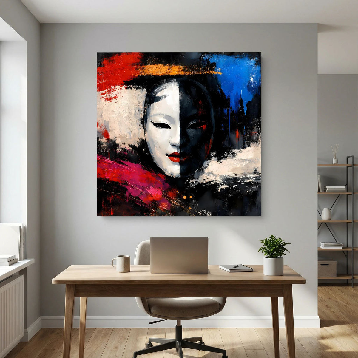 Leinwand-Wandbild zeigt Geisha-Maske, abstrakt überlagert mit Rot-, Blau- und Schwarzspritzern