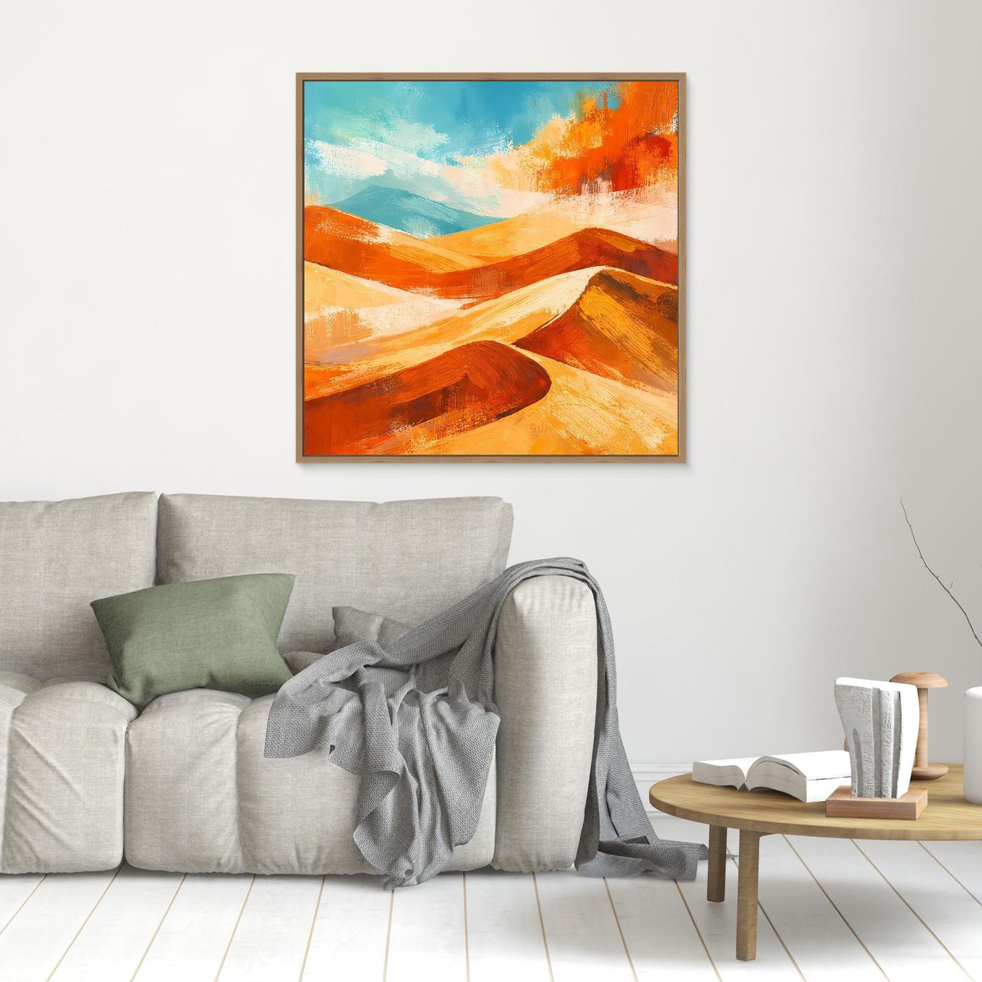 Abstract desert wall art with orange and gold dunes and blue sky; brown frame