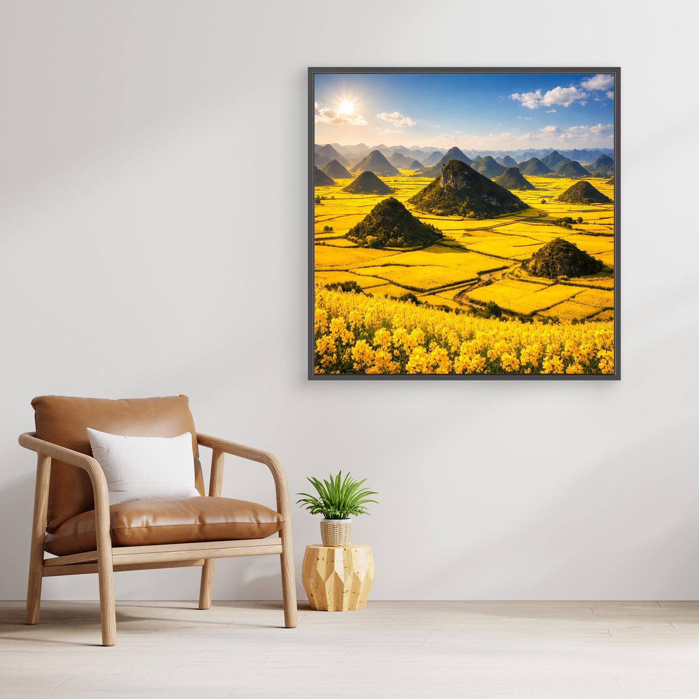 Leinwandbild mit goldenem Rapsfeld und Karstbergen im schwarzen Rahmen