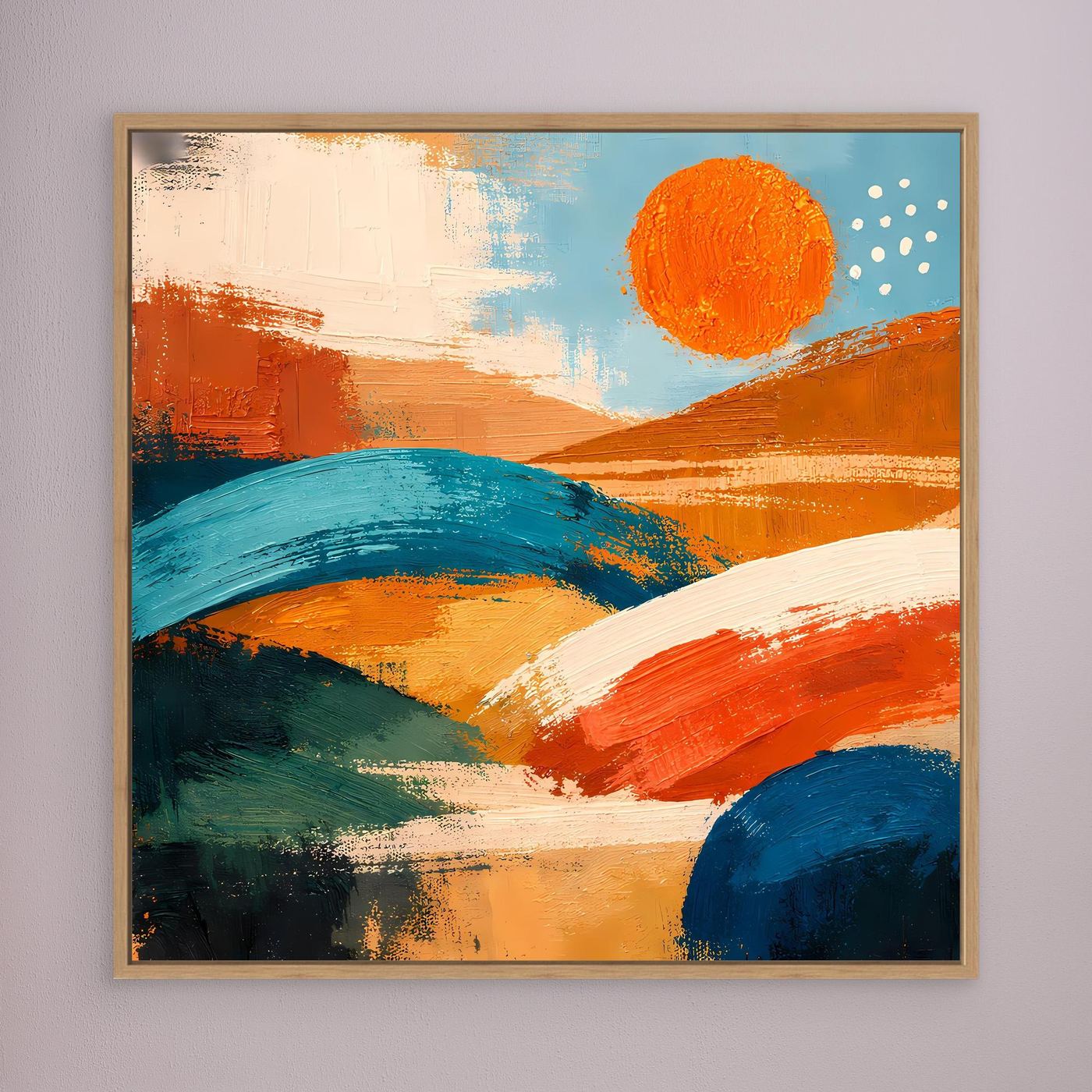 Framed canvas wall art with light wood frame, abstract orange and blue hills