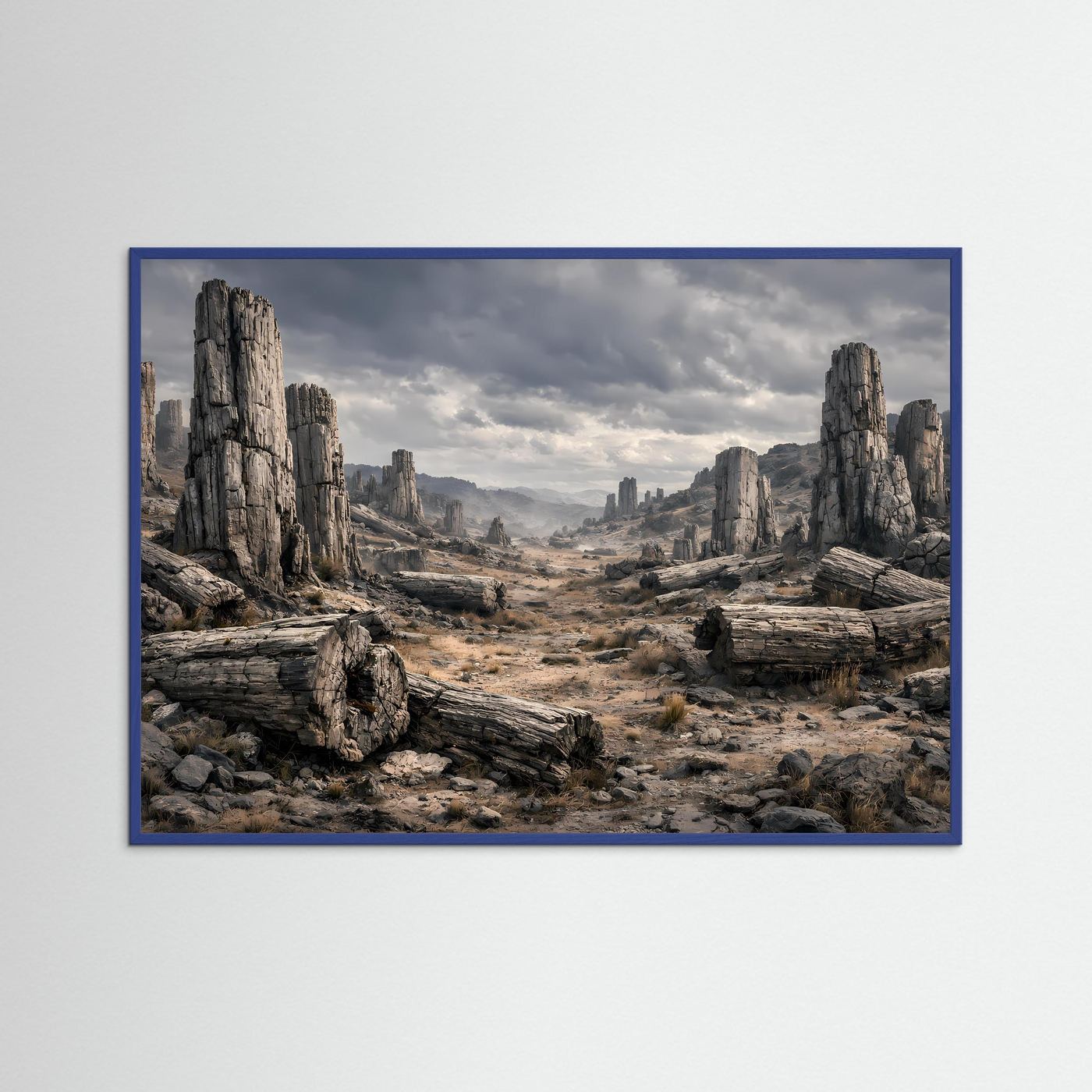 Querformatiges Landschafts-Poster im blauem Rahmen mit steinigen Felsformationen