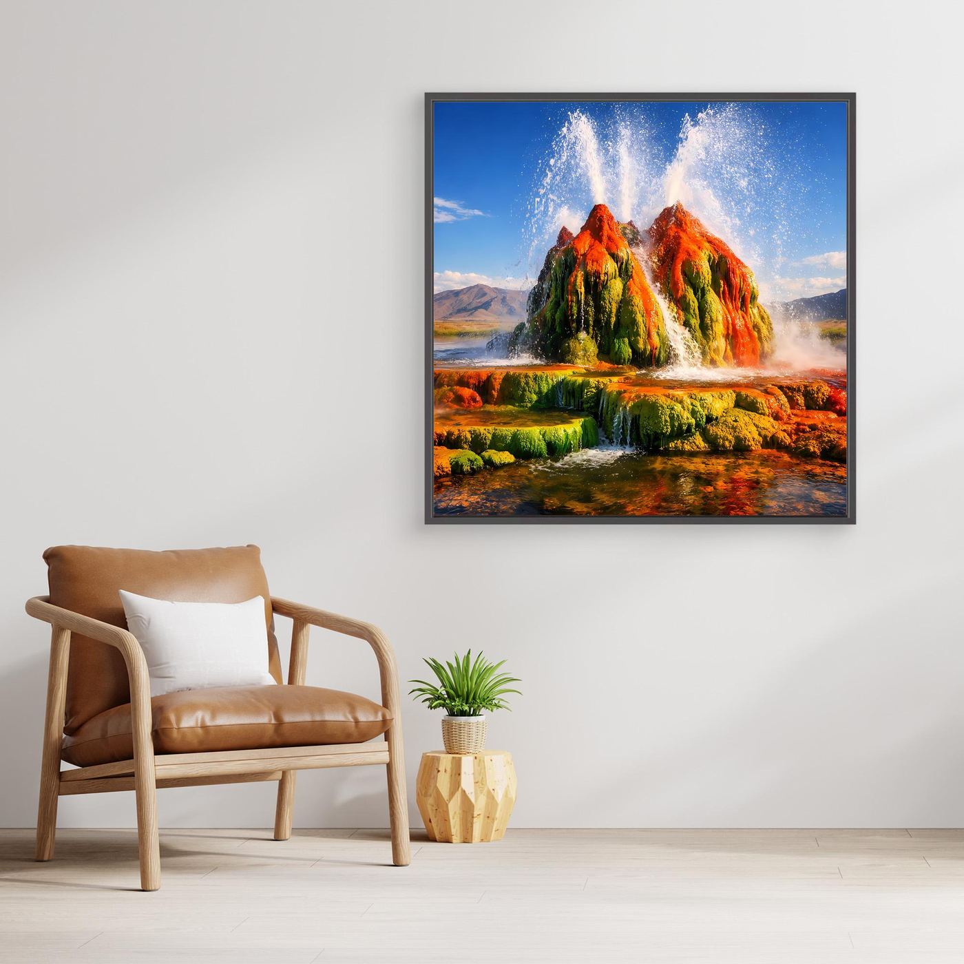 Gerahmtes Leinwandbild mit Geysir: farbige Felsen, Wasserfontäne, rechteckig, schwarzer Rahmen.