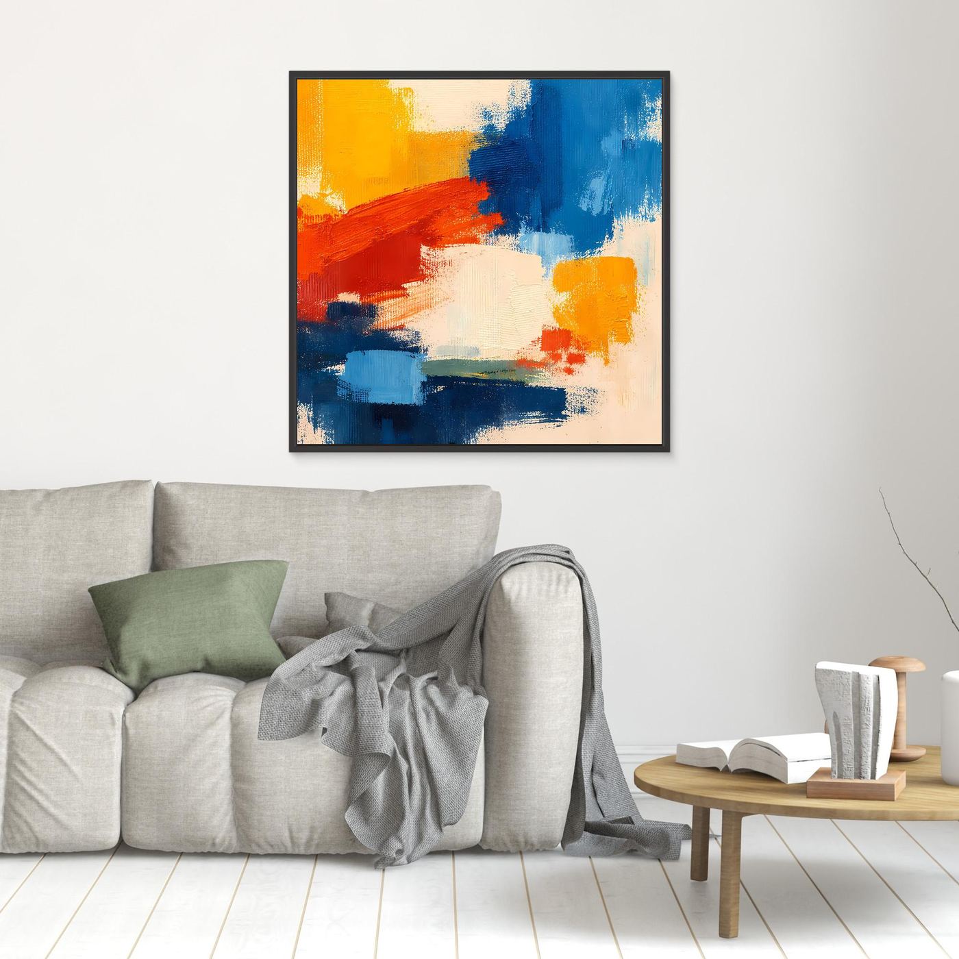 Abstract canvas wall art with blue, red, and yellow brush strokes in a black frame