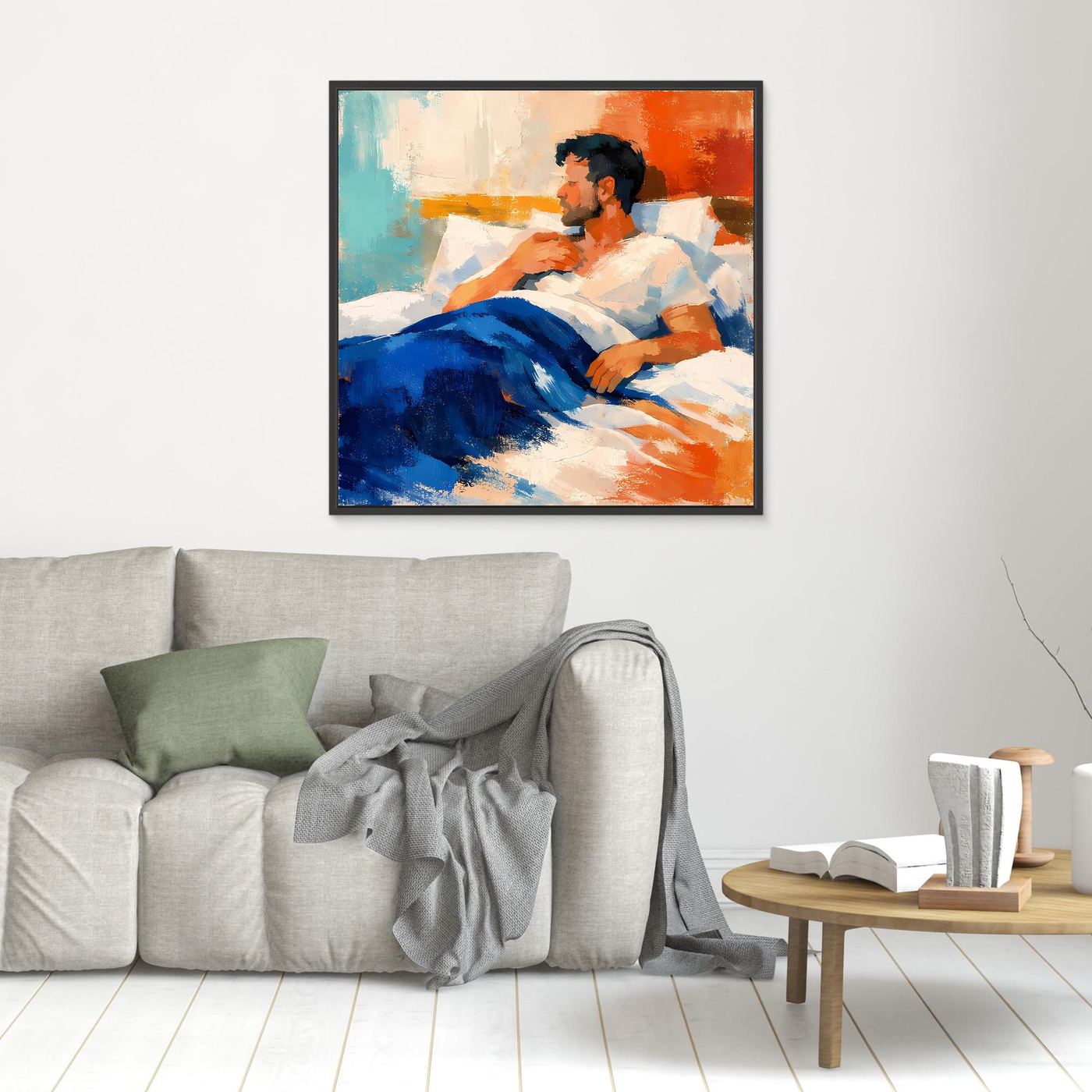Wandbild mit abstraktem Mann im Bett, schwarzer Rahmen, Blau- und Orangetöne