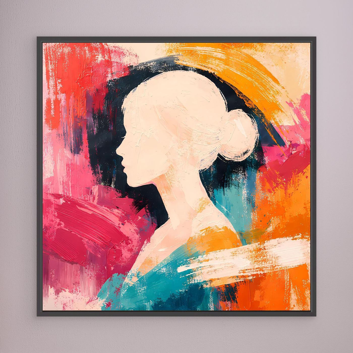 Black-framed canvas wall art showing a woman side-profile silhouette in vivid abstract colors.
