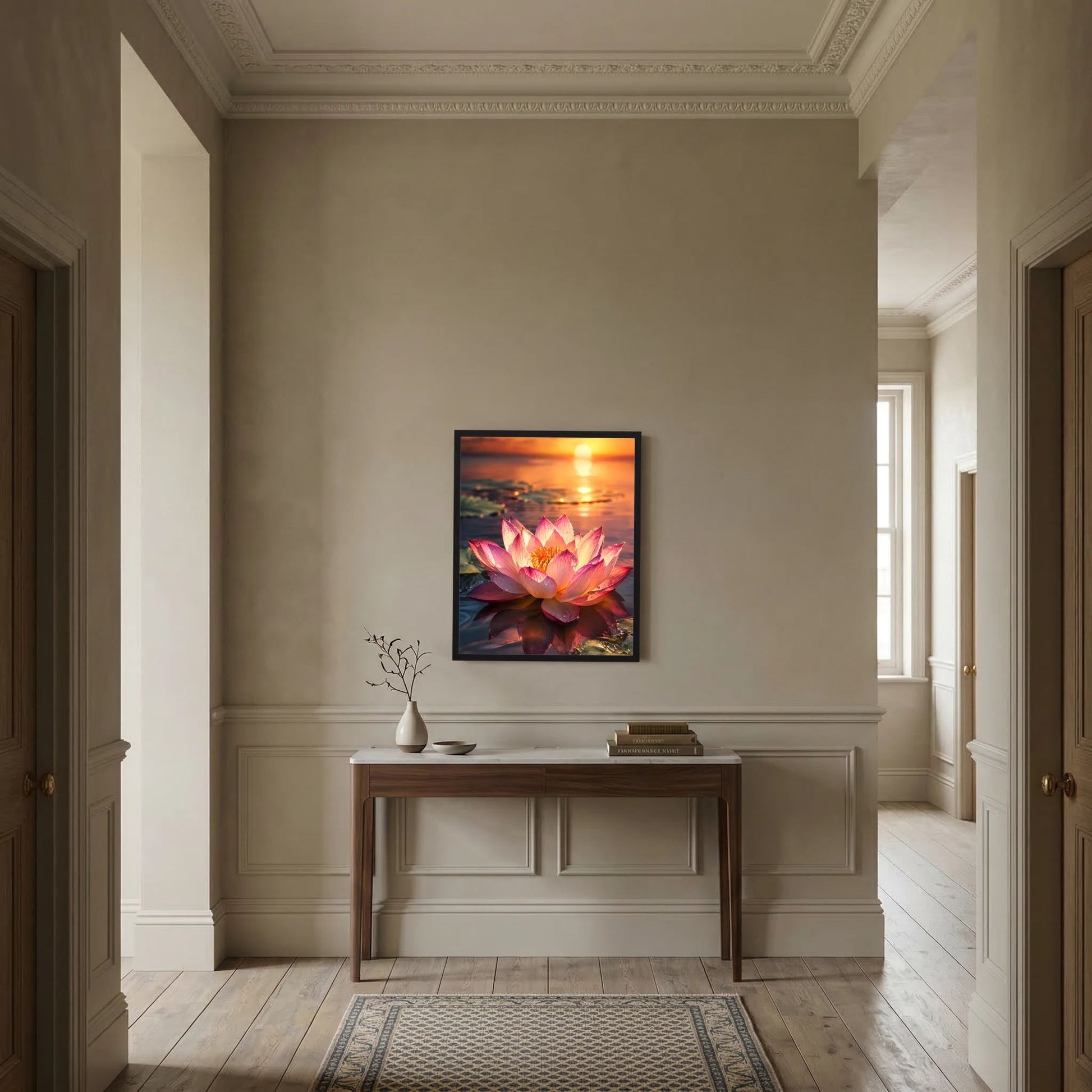 Poster mit rosa Lotusblüte beim Sonnenuntergang in schwarzem Rahmen an Wand