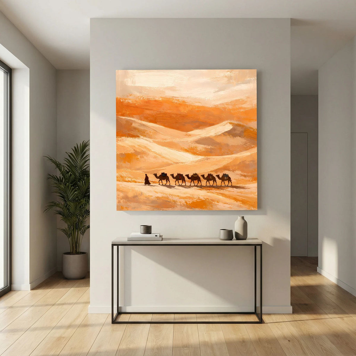 Leinwand-Wandbild mit hellem Holzrahmen: orange Dünenstruktur mit kleinen Kamel-Silhouetten