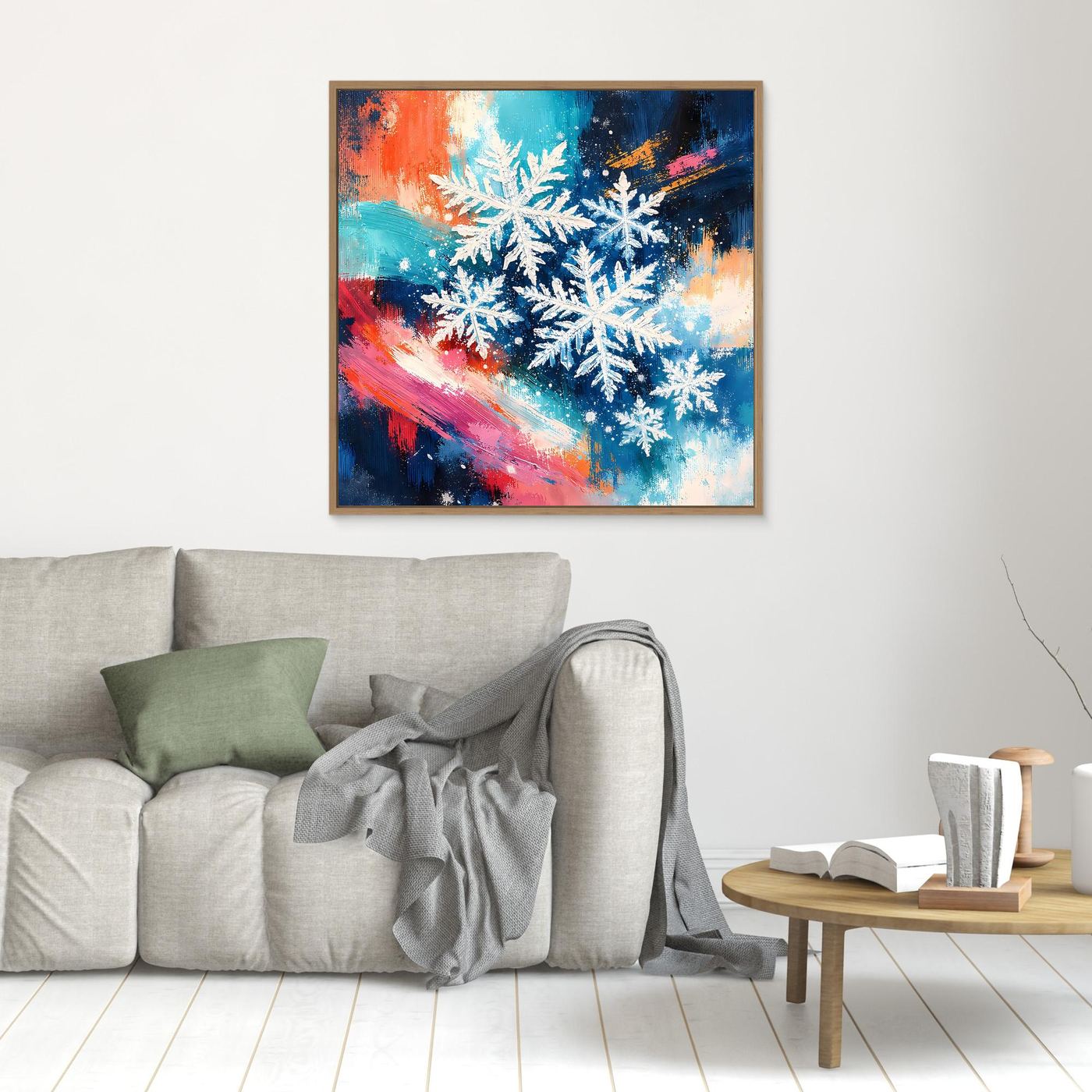 Quadratisches, gerahmtes Leinwandbild mit weißen Schneeflocken und farbigen Pinselstrichen