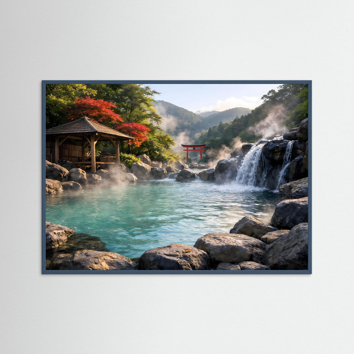 Wellness-Poster mit Torii, Wasserfall und türkisfarbenem Becken im schwarzen Rahmen