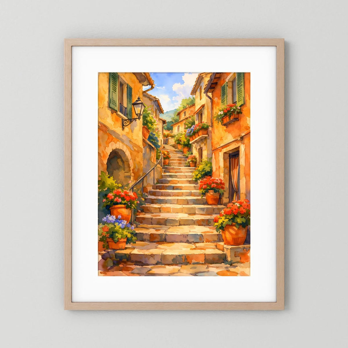 Gerahmtes Wandbild (hellbrauner Holzrahmen) mit weißem Rand und mediterraner Treppe