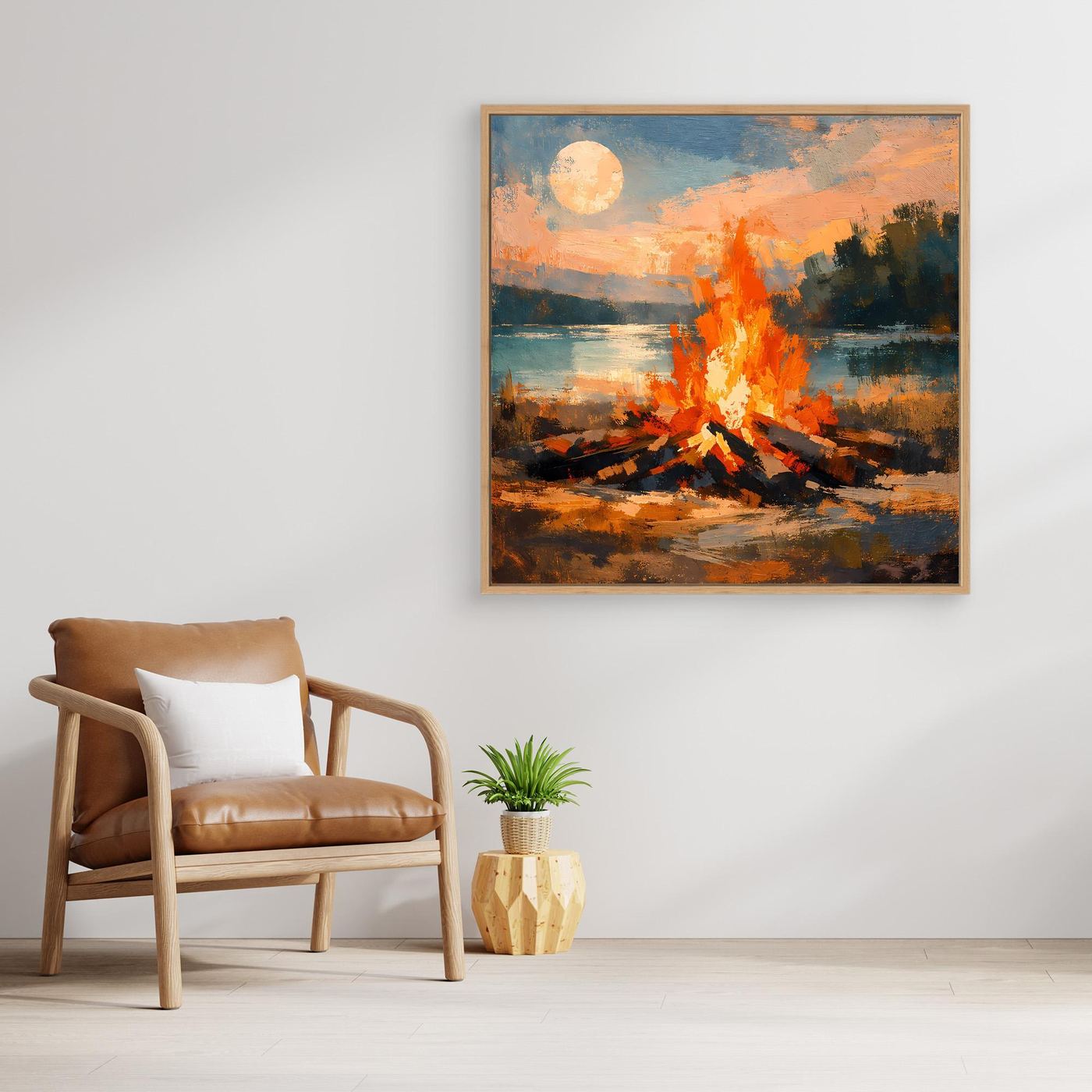 Wandbild auf Leinwand mit Lagerfeuer am See, helle Holzumrandung, orange Flammen und Seeufer