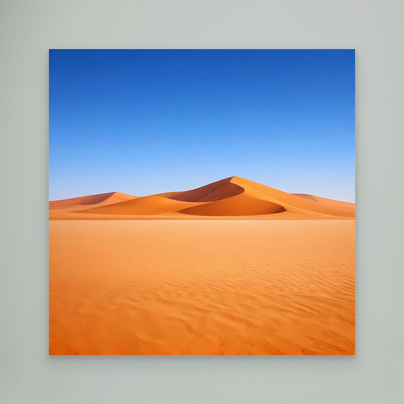 Leinwandbild mit Sanddünen in Orange und Blau, weißer Rand