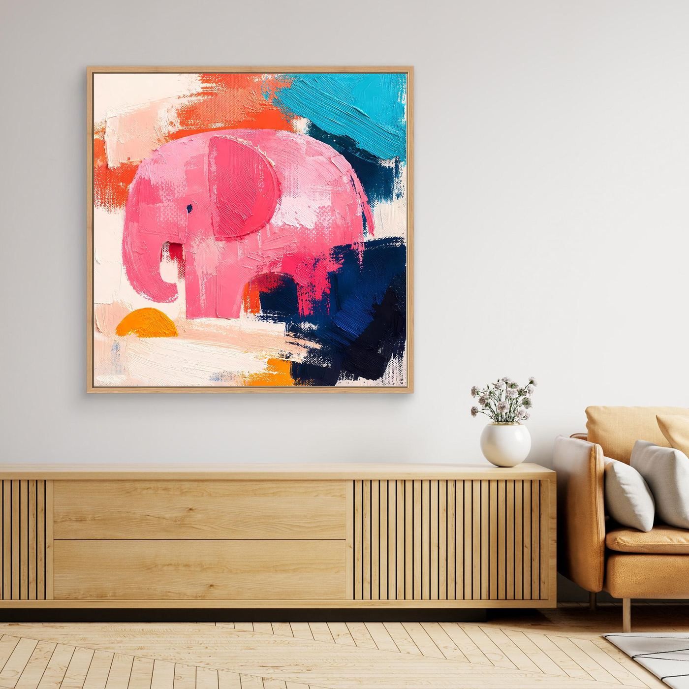 Abstract elephant canvas painting with pink elephant and teal blue strokes, oak frame