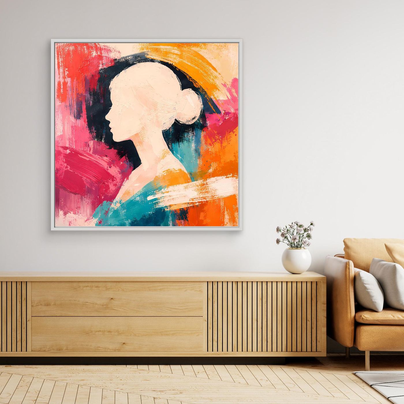 White-framed abstract female portrait silhouette canvas with colorful paint strokes