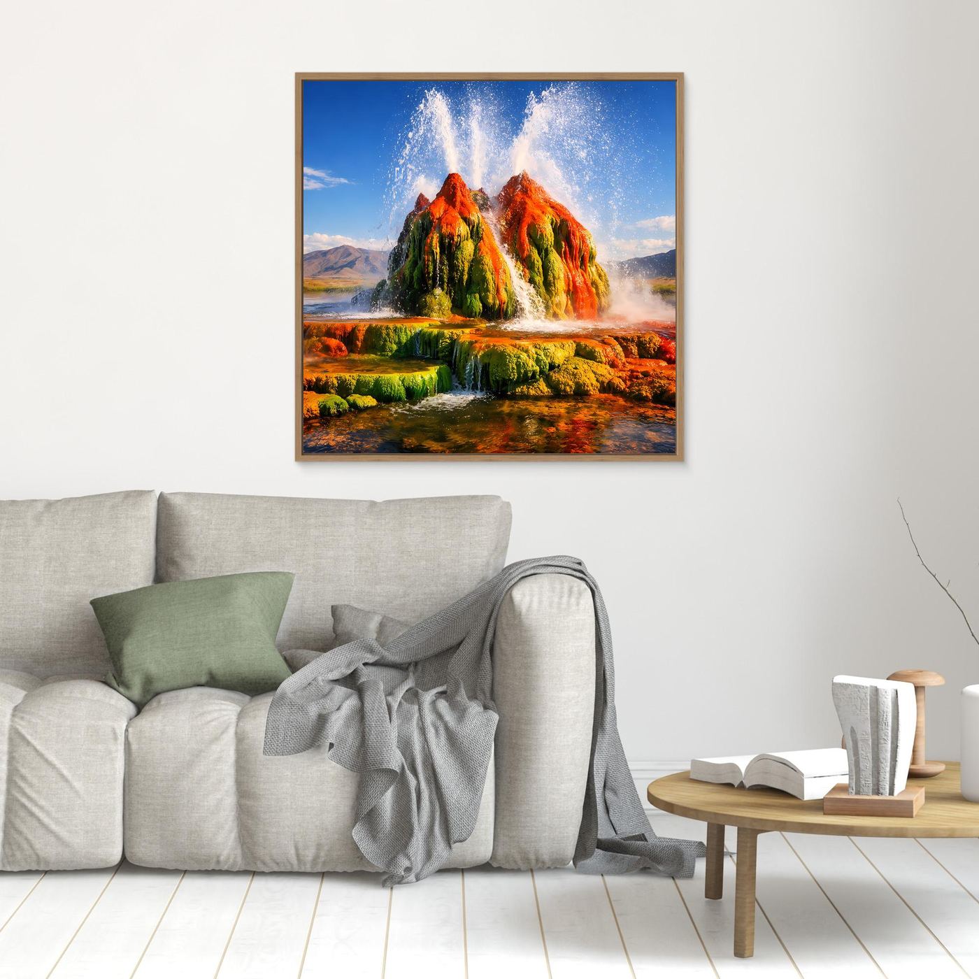 Gerahmtes Leinwandbild mit Geysir-Fontänen über Landschaft in Grün, Orange und Blau