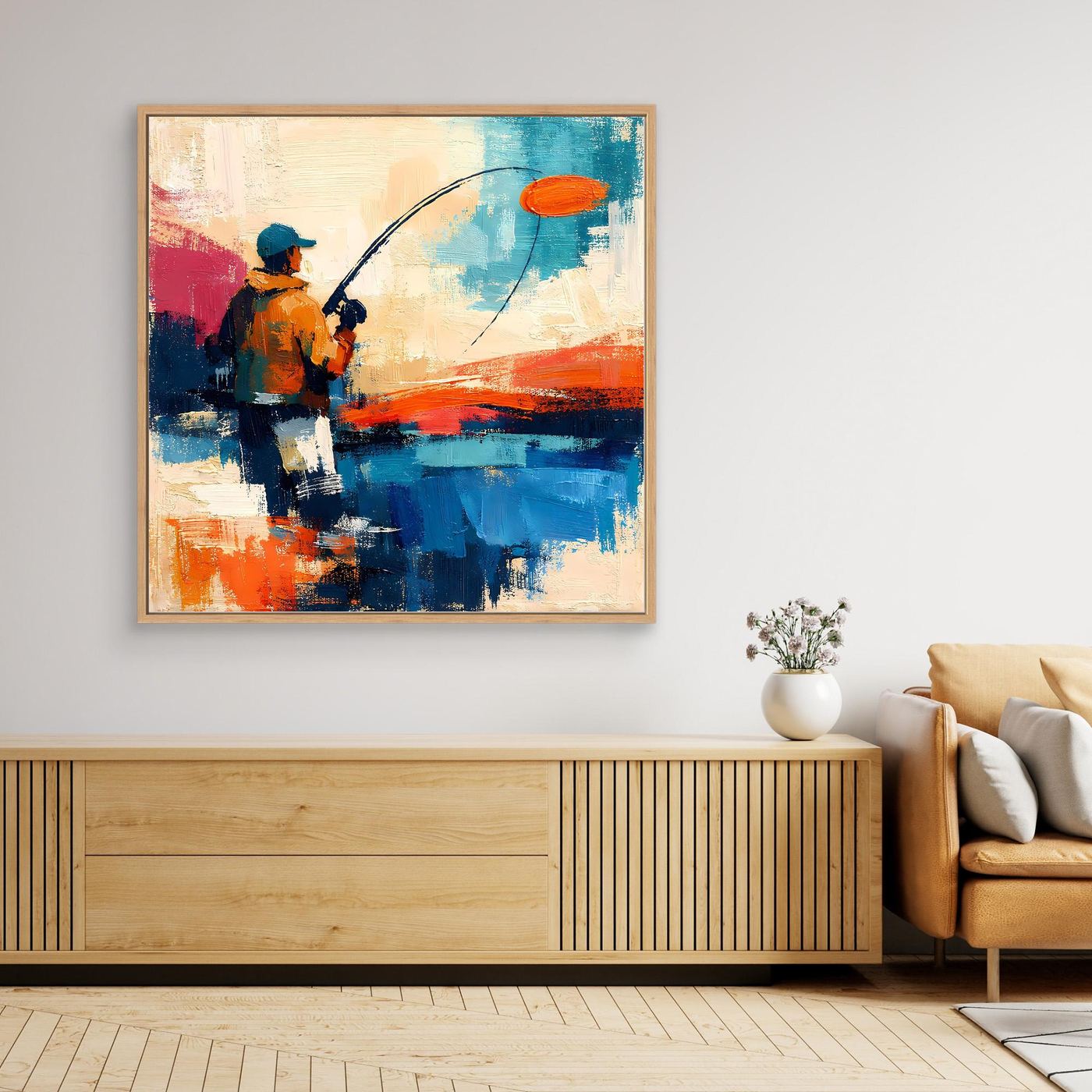 Light wood framed abstract fishing painting with orange, blue, and red painterly strokes