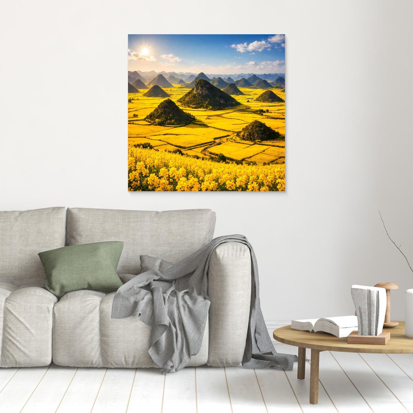 Leinwandbild: goldenes Rapsfeld mit Karstbergen, heller Holzrahmen.