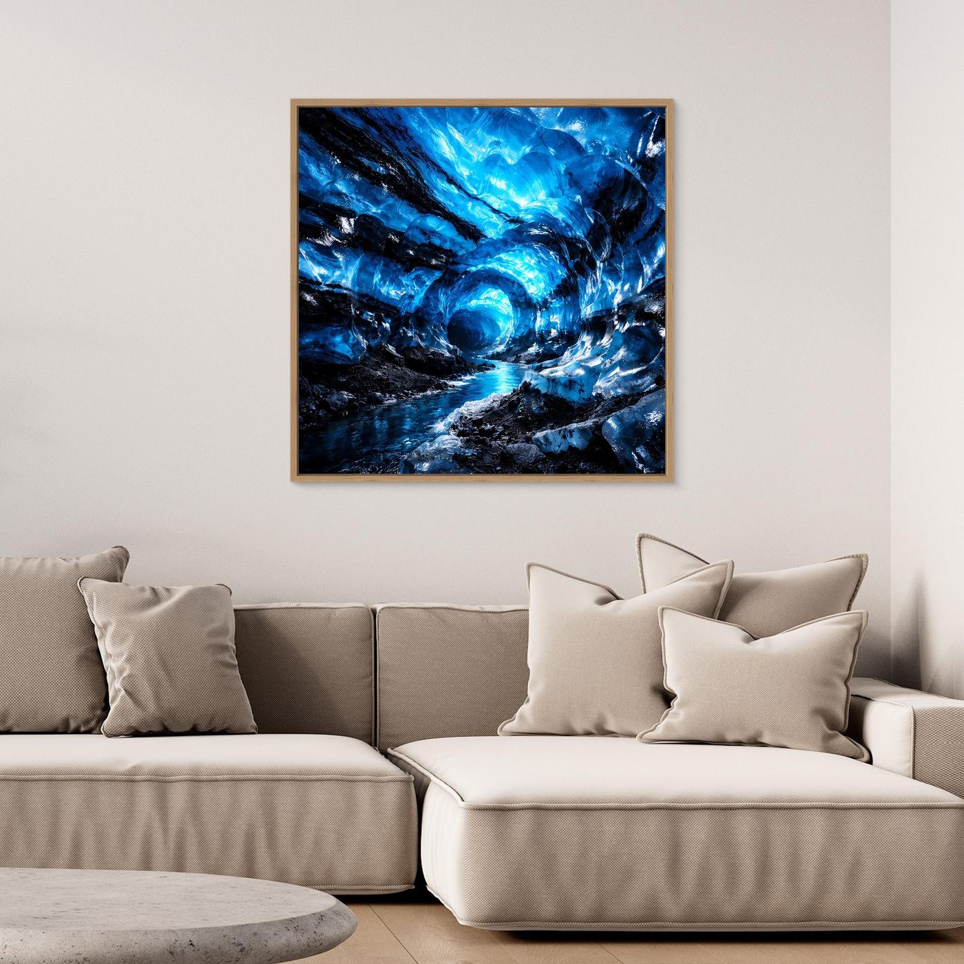 Leinwandbild mit blauem Eishöhlen-Motiv und Lichtkreis, Holzrahmen in Hellbraun