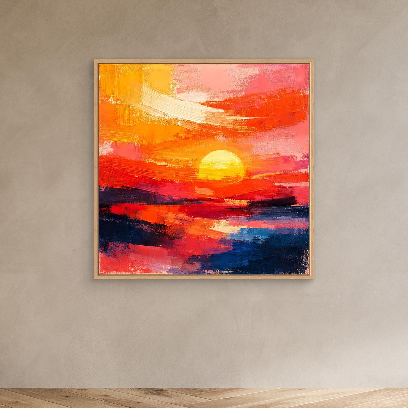 Abstract sunset wall art in a light frame, featuring glowing sun and ocean in red, orange, and blue.