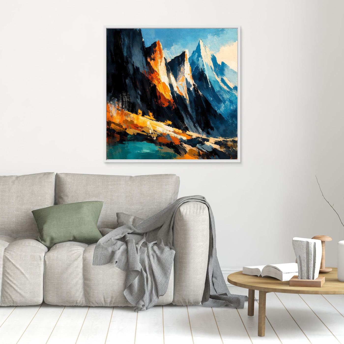 Abstraktes Wandbild mit Bergspitzen in Blau, Schwarz und Orange, weiß gerahmt