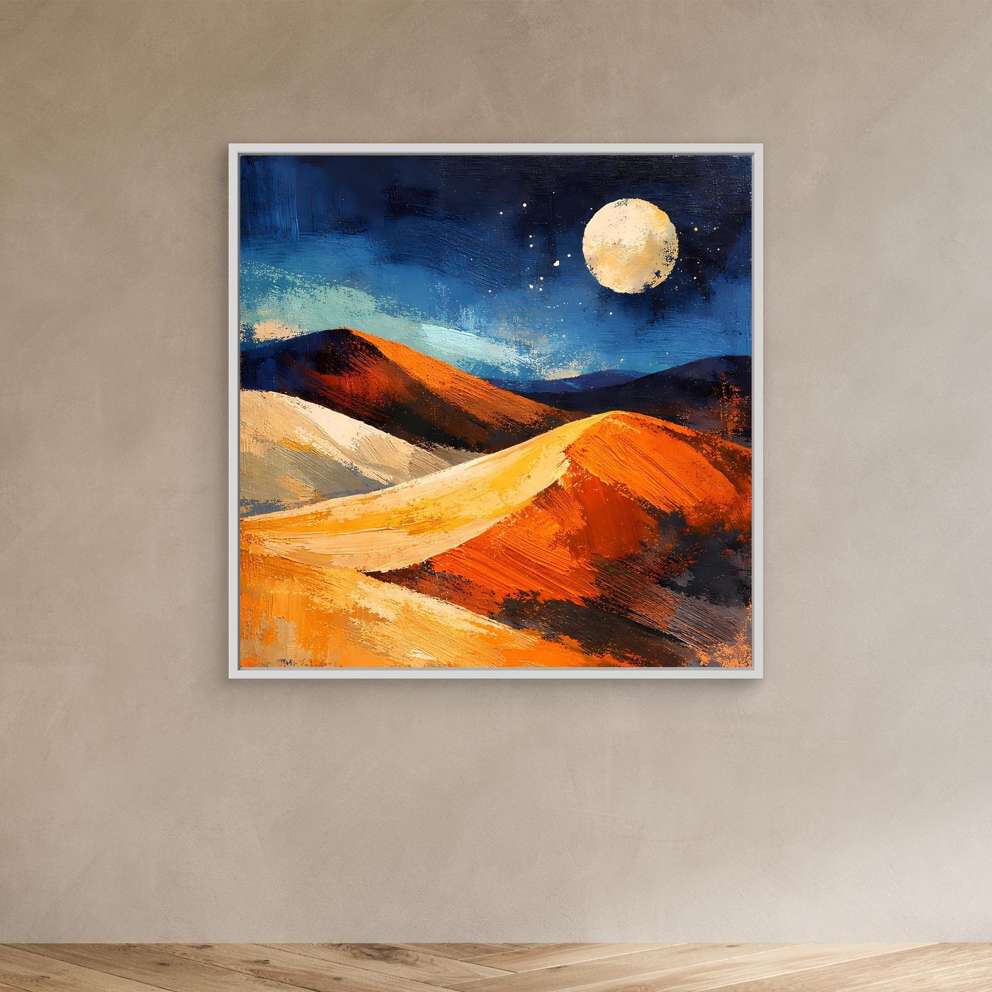 Abstract desert wall art with moon over sand dunes at night, in a light gray frame