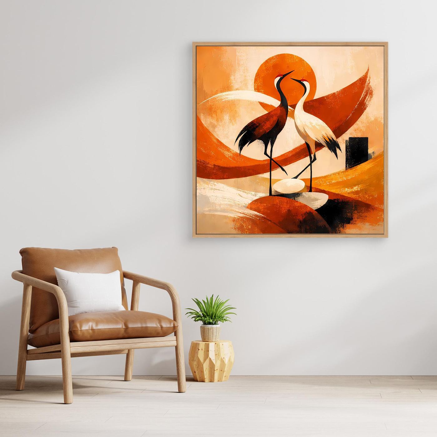 Leinwandbild mit Kranichen im hellbraunen Holzrahmen, orange-weißes Sonnenmotiv