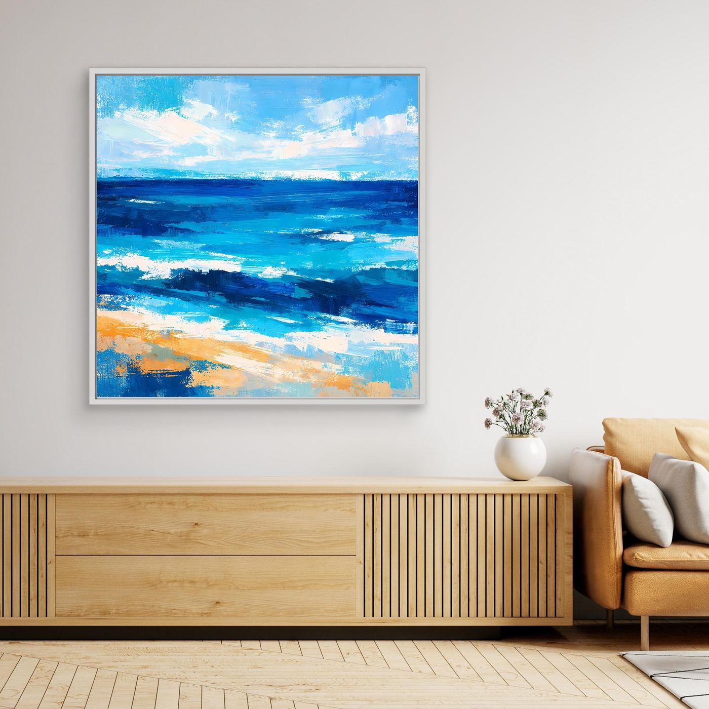 Framed canvas wall art with abstract blue ocean waves and sandy highlights